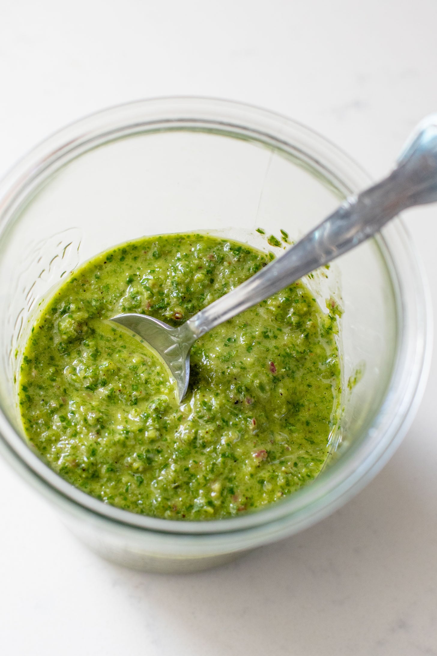 This Roasted Cauliflower with Chimichurri Rice is a flavor packed meal! Cauliflower & chickpeas seasoned and roasted until crispy over herby rice | ThisSavoryVegan.com #chimichurrirecipe #roastedcauliflower #veggiedinner