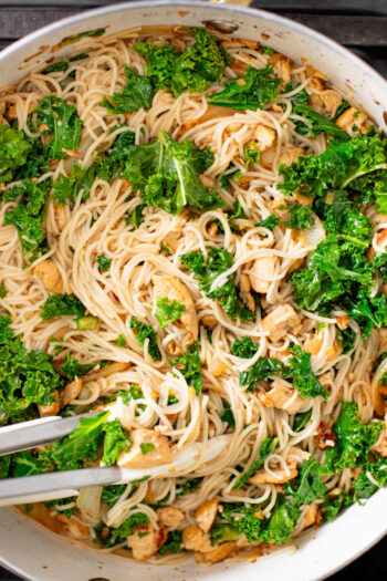 These Simple Kale & Tofu Noodles are an easy vegan weeknight dinner idea! Crispy tofu, wilted kale and rice noodles in a soy-based sauce | ThisSavoryVegan.com #thissavoryvegan #simplenoodles #veganmealprep