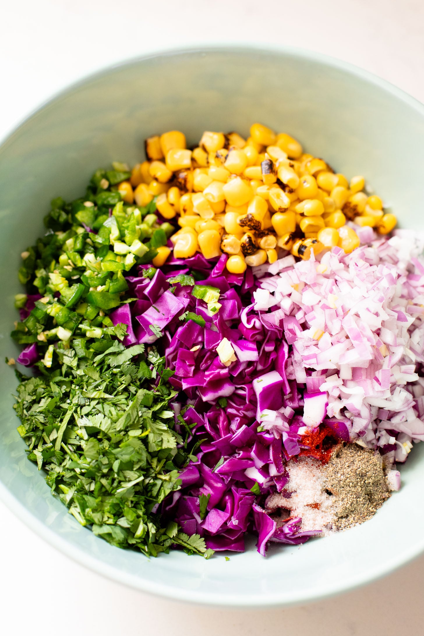 These BBQ Tofu Quinoa Bowls are layered with saucy BBQ tofu, quinoa, black beans, corn & cabbage slaw, tomatoes, avocado & vegan ranch | ThisSavoryVegan.com #thissavoryvegan #quinoabowl #easyveganrecipes