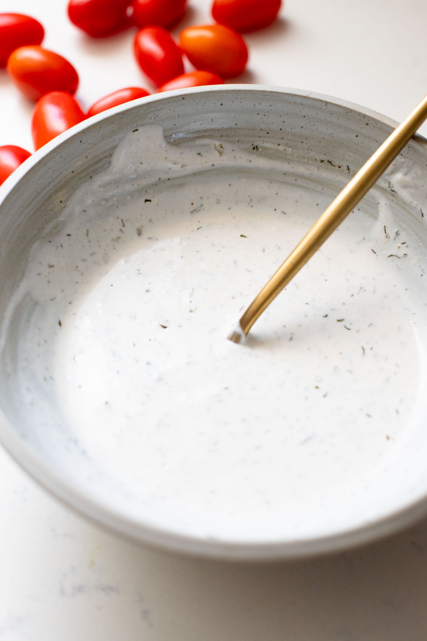 These BBQ Tofu Quinoa Bowls are layered with saucy BBQ tofu, quinoa, black beans, corn & cabbage slaw, tomatoes, avocado & vegan ranch | ThisSavoryVegan.com #thissavoryvegan #quinoabowl #easyveganrecipes