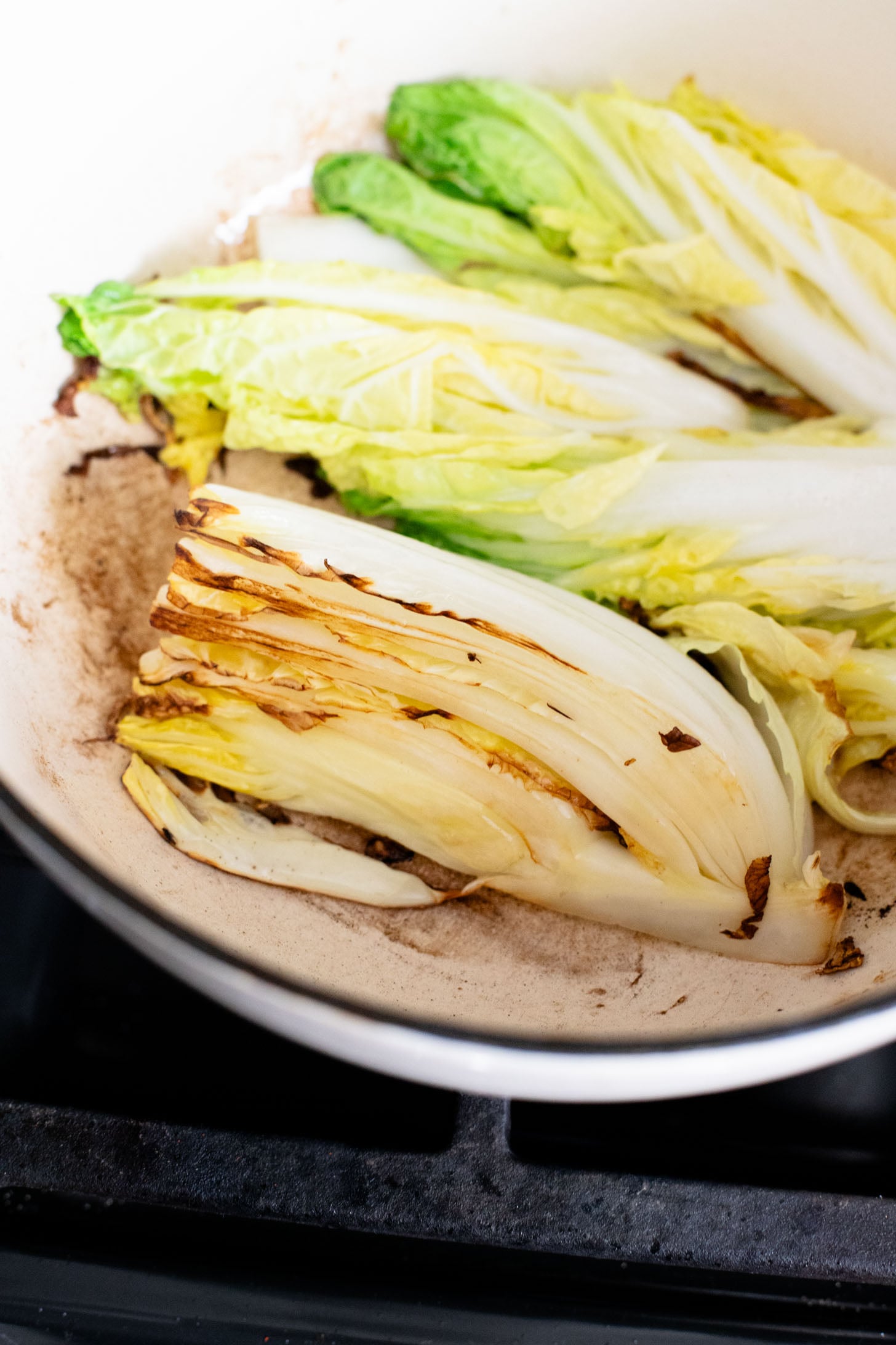 This Braised Cabbage & Lentils recipe is perfection! Napa cabbage is cooked in a coconut curry sauce with lentils until super tender | ThisSavoryVegan.com #thissavoryvegan #napacabbagerecipes #cozyveganrecipes