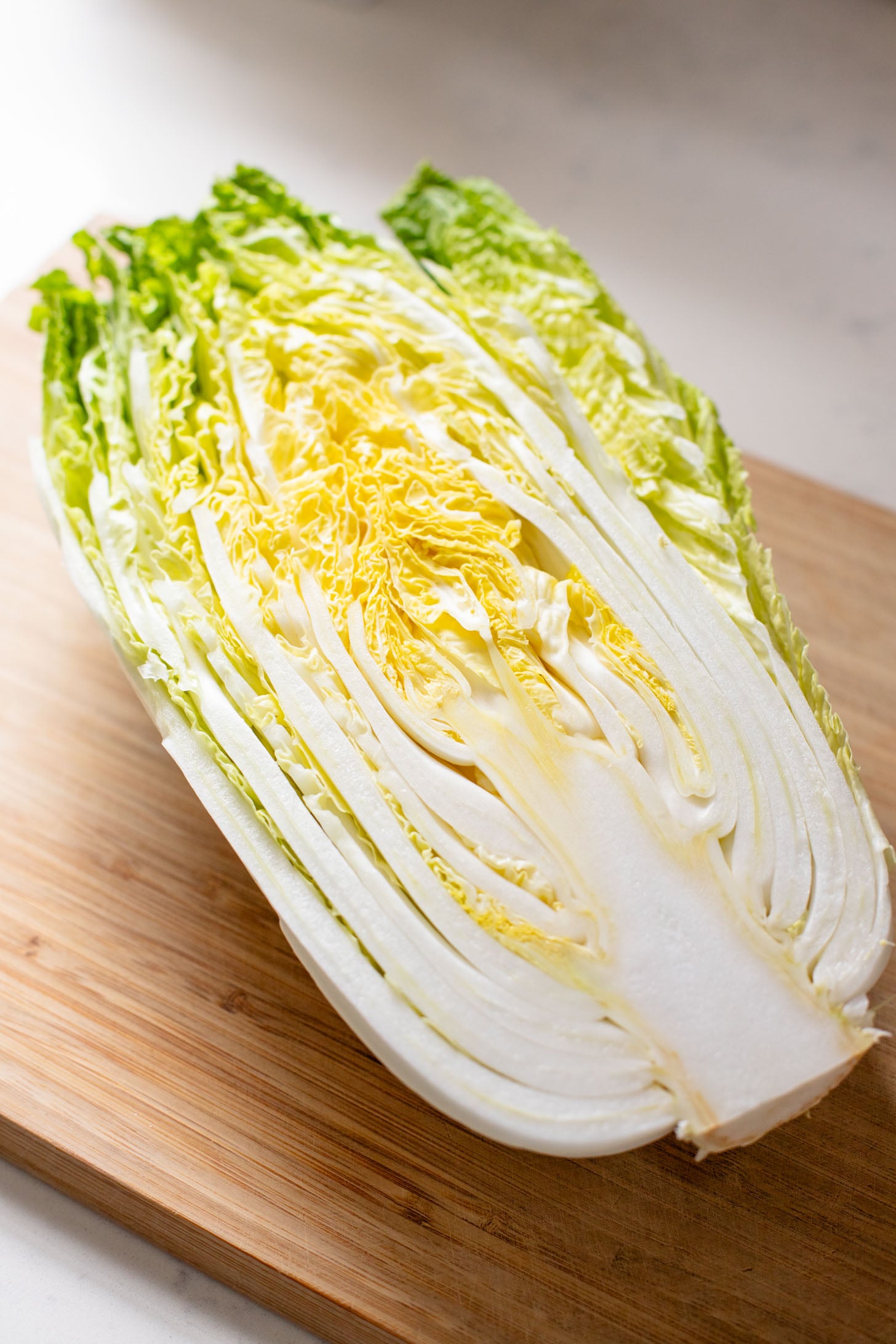 This Braised Cabbage & Lentils recipe is perfection! Napa cabbage is cooked in a coconut curry sauce with lentils until super tender | ThisSavoryVegan.com #thissavoryvegan #napacabbagerecipes #cozyveganrecipes