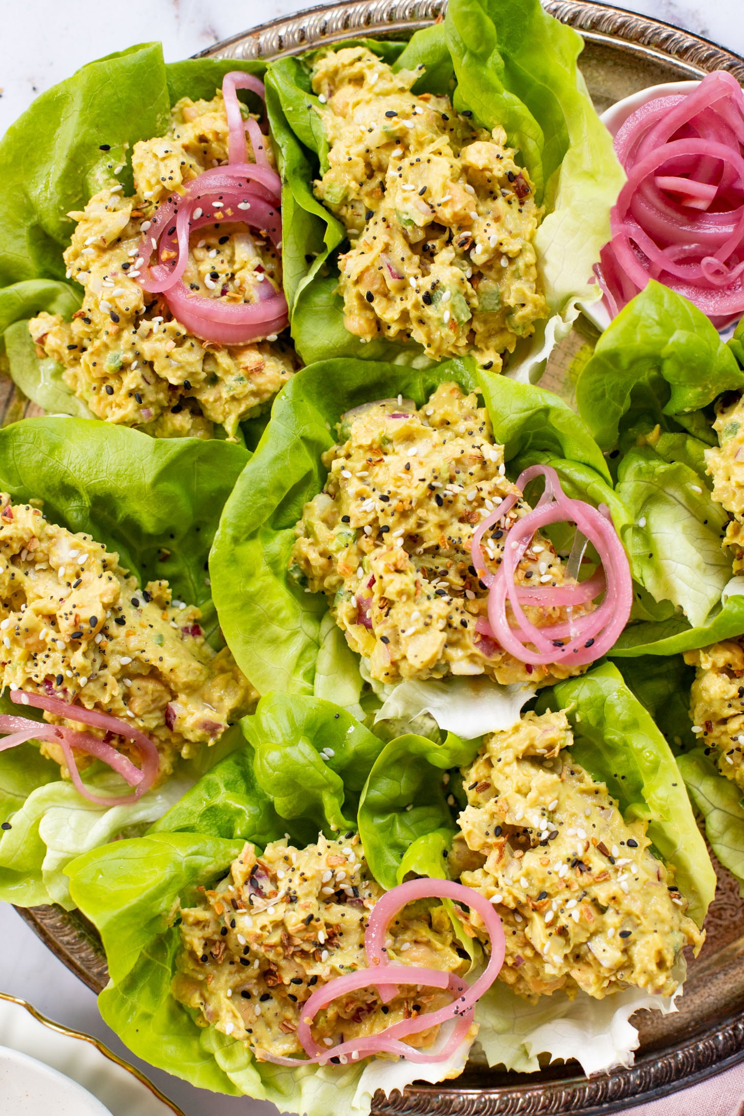 These Chickpea Salad Lettuce Wraps are a healthy & delicious vegan lunch or dinner! Quick to make and great for on-the-go | ThisSavoryVegan.com #thissavoryvegan #chickpeasalad #healthylunchideas