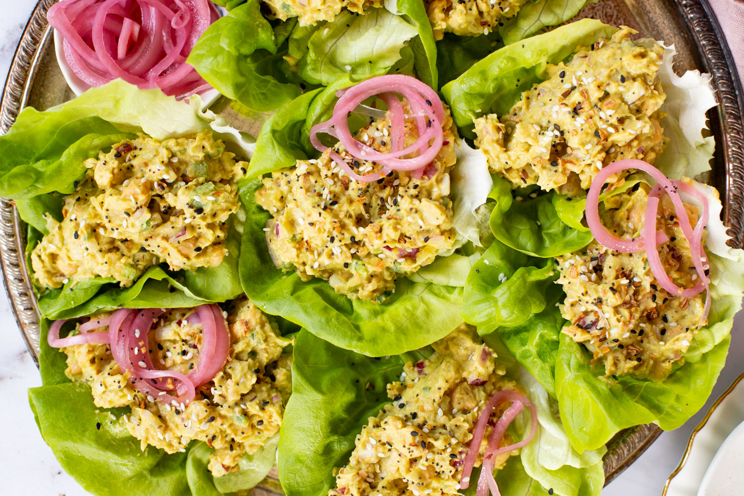 These Chickpea Salad Lettuce Wraps are a healthy & delicious vegan lunch or dinner! Quick to make and great for on-the-go | ThisSavoryVegan.com #thissavoryvegan #chickpeasalad #healthylunchideas