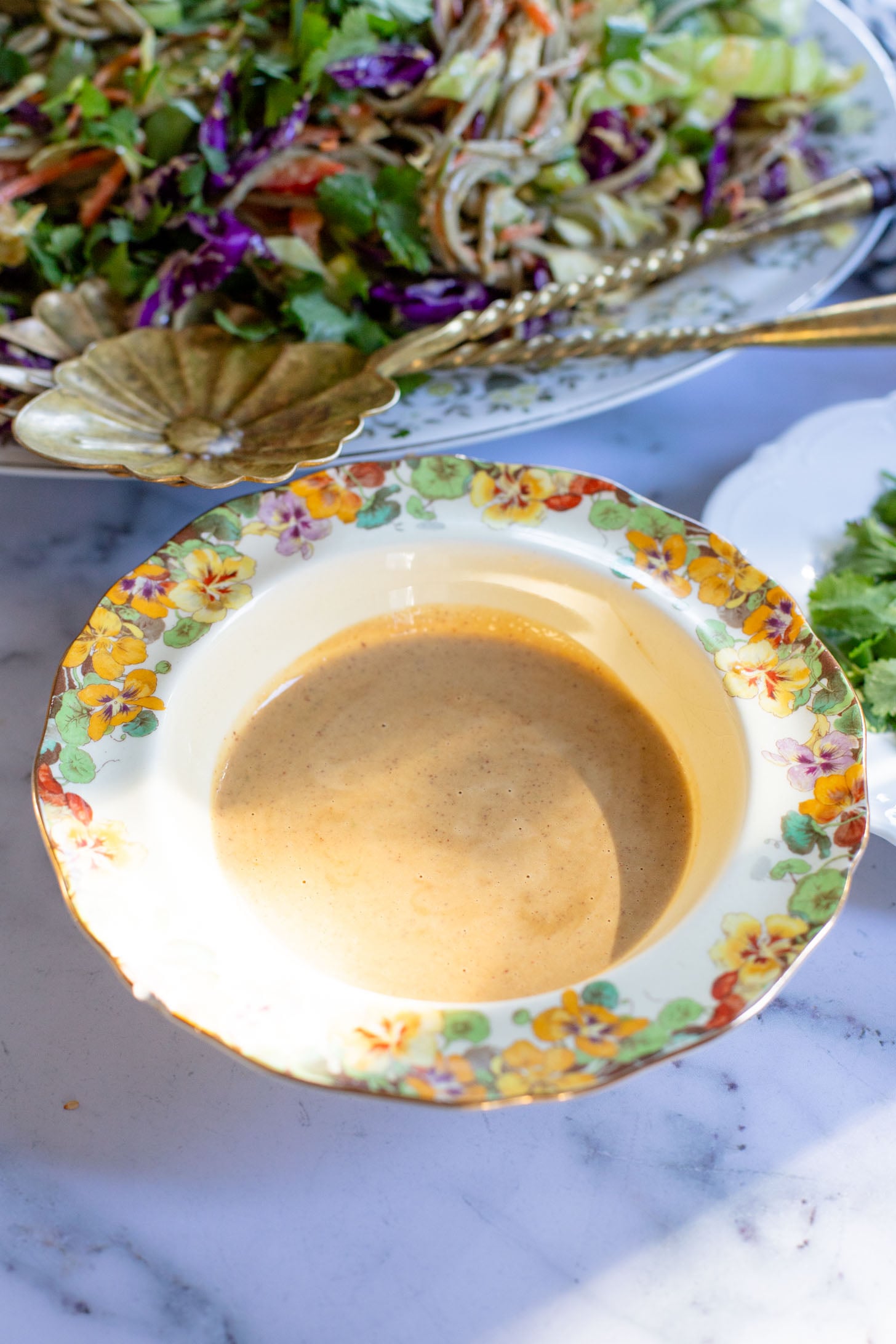 This Cold Peanut Noodle Salad is loaded with crunchy veggies, tender soba noodles and the BEST peanut sauce you've ever had | ThisSavoryVegan.com #thissavoryvegan #coldnoodles #peanutsalad