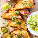 These Crispy Oyster Mushroom Tacos are a veggie dream! Roasted veggies are layered in corn tortillas & baked until crispy. Taco Tuesday goals | ThisSavoryVegan.com #thissavoryvegan #vegantacos #mushroomtacos
