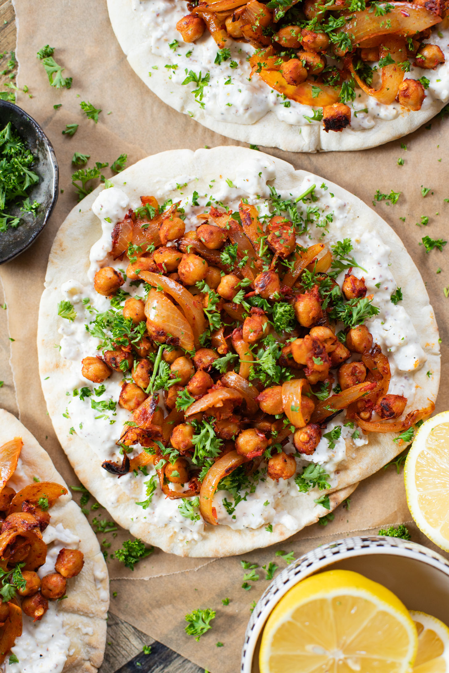 These Harissa Chickpea Pitas are layered with a lemon vegan feta sauce and crispy chickpeas cooked in a delicious harissa sauce | ThisSavoryVegan.com #pitasandwich #easyveganlunch #lunchideas
