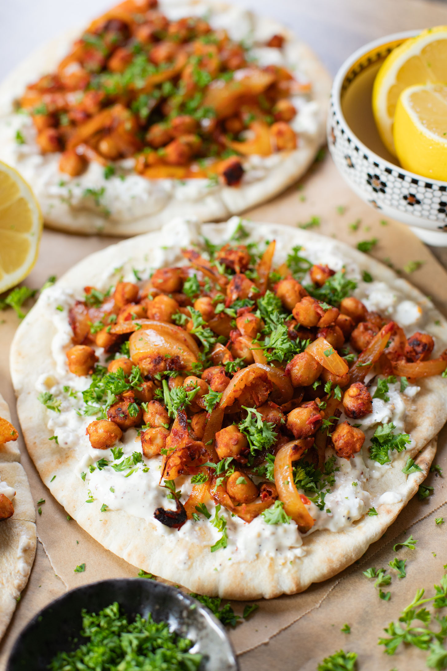 These Harissa Chickpea Pitas are layered with a lemon vegan feta sauce and crispy chickpeas cooked in a delicious harissa sauce | ThisSavoryVegan.com #pitasandwich #easyveganlunch #lunchideas