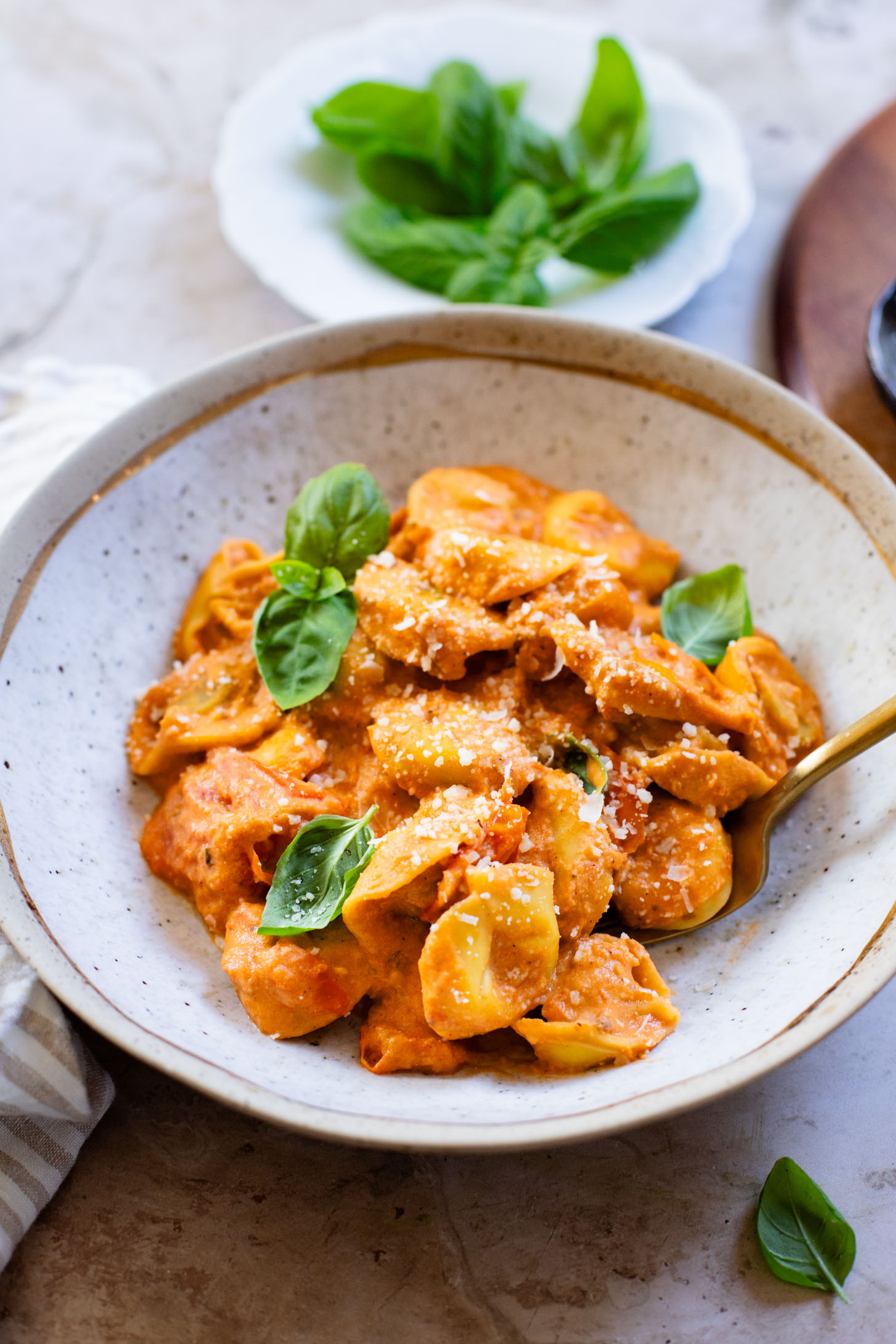 This Roasted Tomato Ricotta Tortellini is made with pre-made vegan tortellini and a simple & creamy tomato sauce! Perfect for date night | ThisSavoryVegan.com #thissavoryvegan #vegantortellini #valentinesdayrecipes