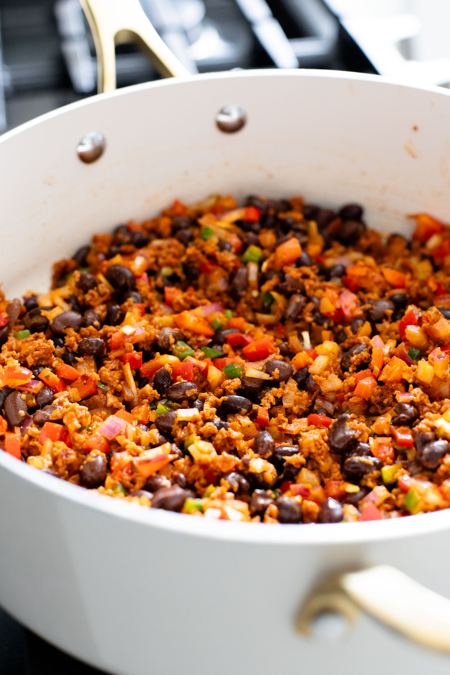These Taco Stuffed Sweet Potatoes are a healthy and delicious vegan dinner idea. Filled with beans, cilantro lime rice, soyrizo & veggies | ThisSavoryVegan.com #thissavoryvegan #healthydinner #sweetpotatorecipes