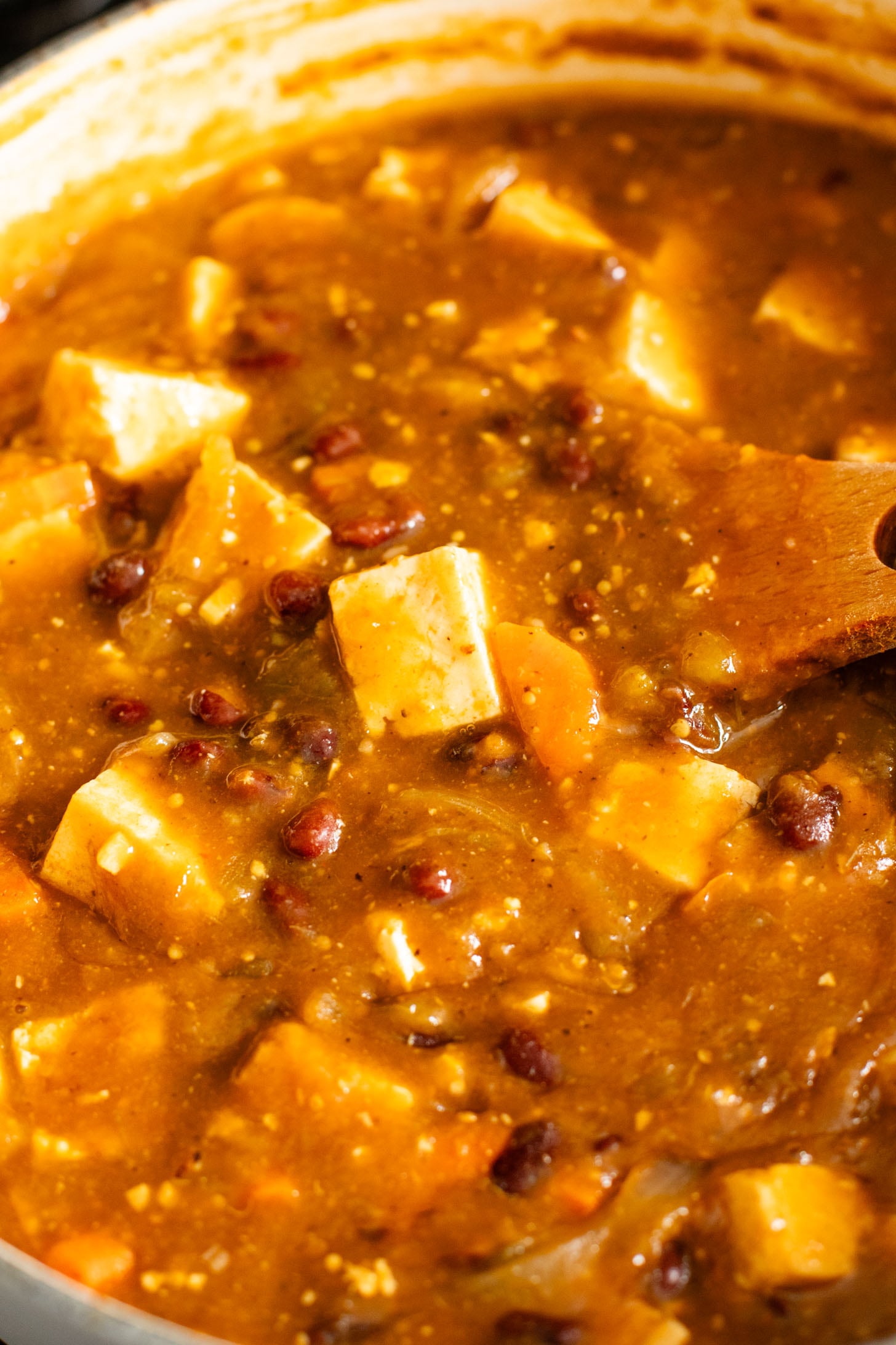 This Tofu Chile Verde is a stew made with green chiles, green enchilada sauce, veggies, tofu & black beans. A healthy & easy vegan dinner | ThisSavoryVegan.com #thissavoryvegan #highproteinveganrecipes #veganstew