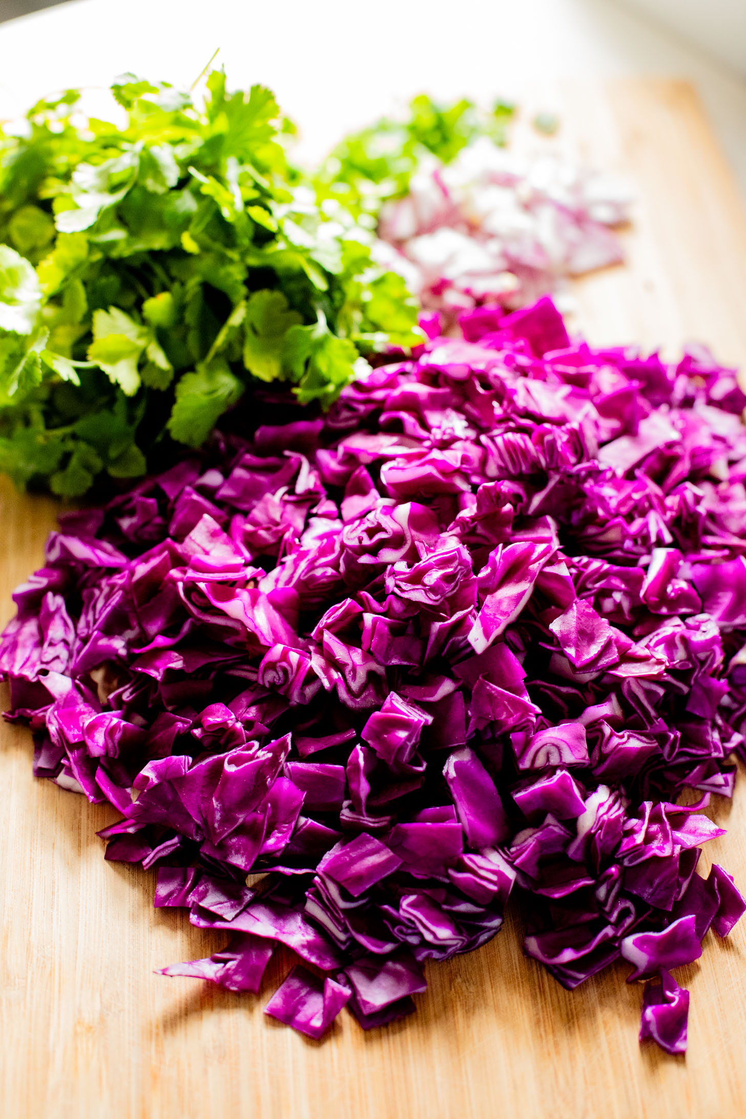 This Black Bean Quinoa Salad is filled with crunchy veggies, a light lime dressing, black beans and chilled quinoa. The perfect lunch or dinner | ThisSavoryVegan.com