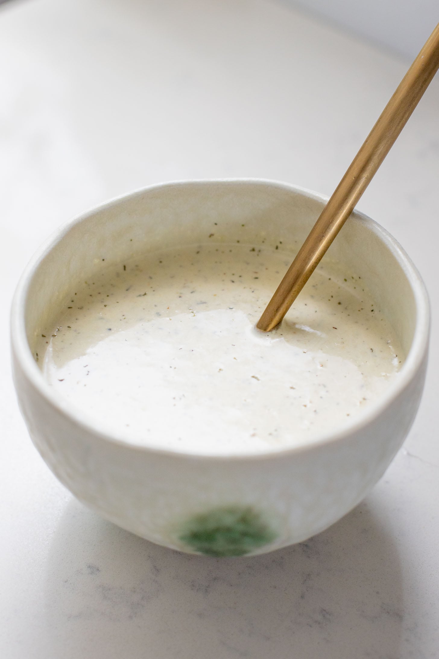 This Buffalo Chickpea Pasta Salad is the ultimate vegan salad! Made with crispy buffalo chickpeas, dairy-free green chile ranch, pasta & veggies | ThisSavoryVegan.com