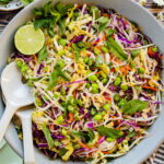 This Edamame Rice Noodle Salad is veggie (and protein) packed. Made with rice noodles and served with a sweet chili lime dressing | ThisSavoryVegan.com