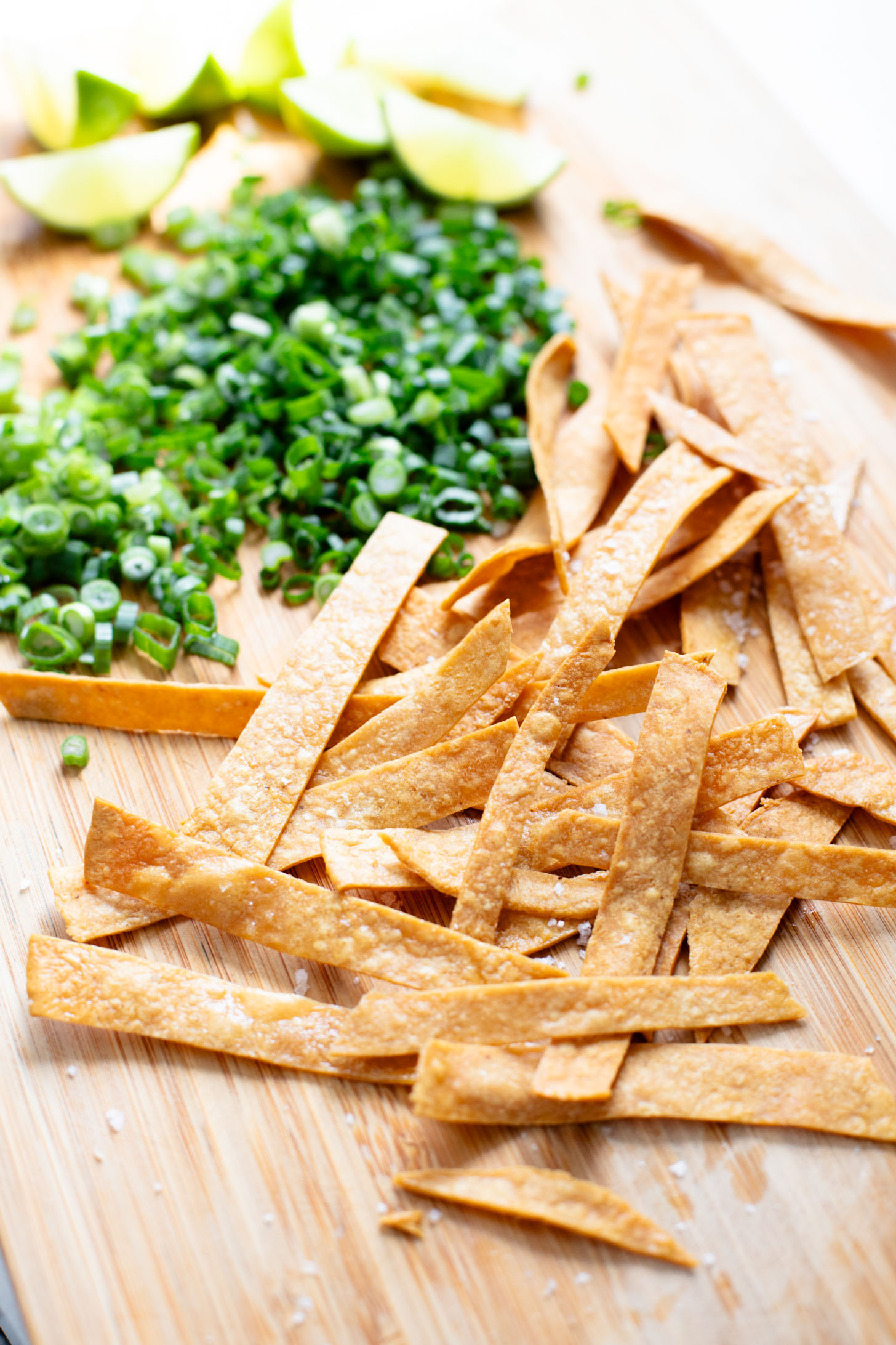 This Roasted Cauliflower Tortilla Soup is cozy and veggie packed! The perfect bowl of soup to warm up with on a cold day | ThisSavoryVegan.com