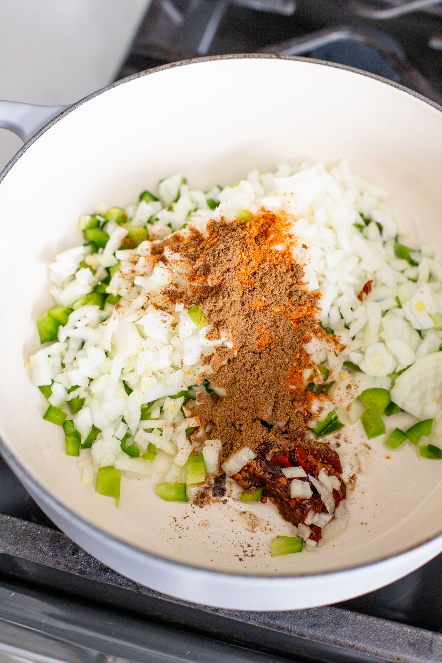 This Roasted Cauliflower Tortilla Soup is cozy and veggie packed! The perfect bowl of soup to warm up with on a cold day | ThisSavoryVegan.com