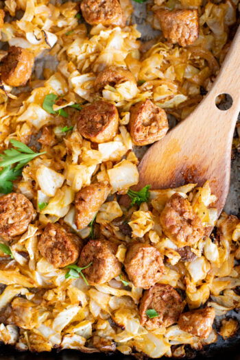 This Sheet Pan Vegan Sausage & Cabbage is an easy, low carb, vegan dinner. Ready in less than an hour and packed with flavor | ThisSavoryVegan.com