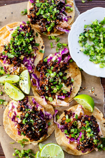 These Soyaki Mushroom Street Tacos are simple, delicious & vegan! Crispy mushrooms tossed in soyaki sauce & spicy slaw on mini corn tortillas | ThisSavoryVegan.com
