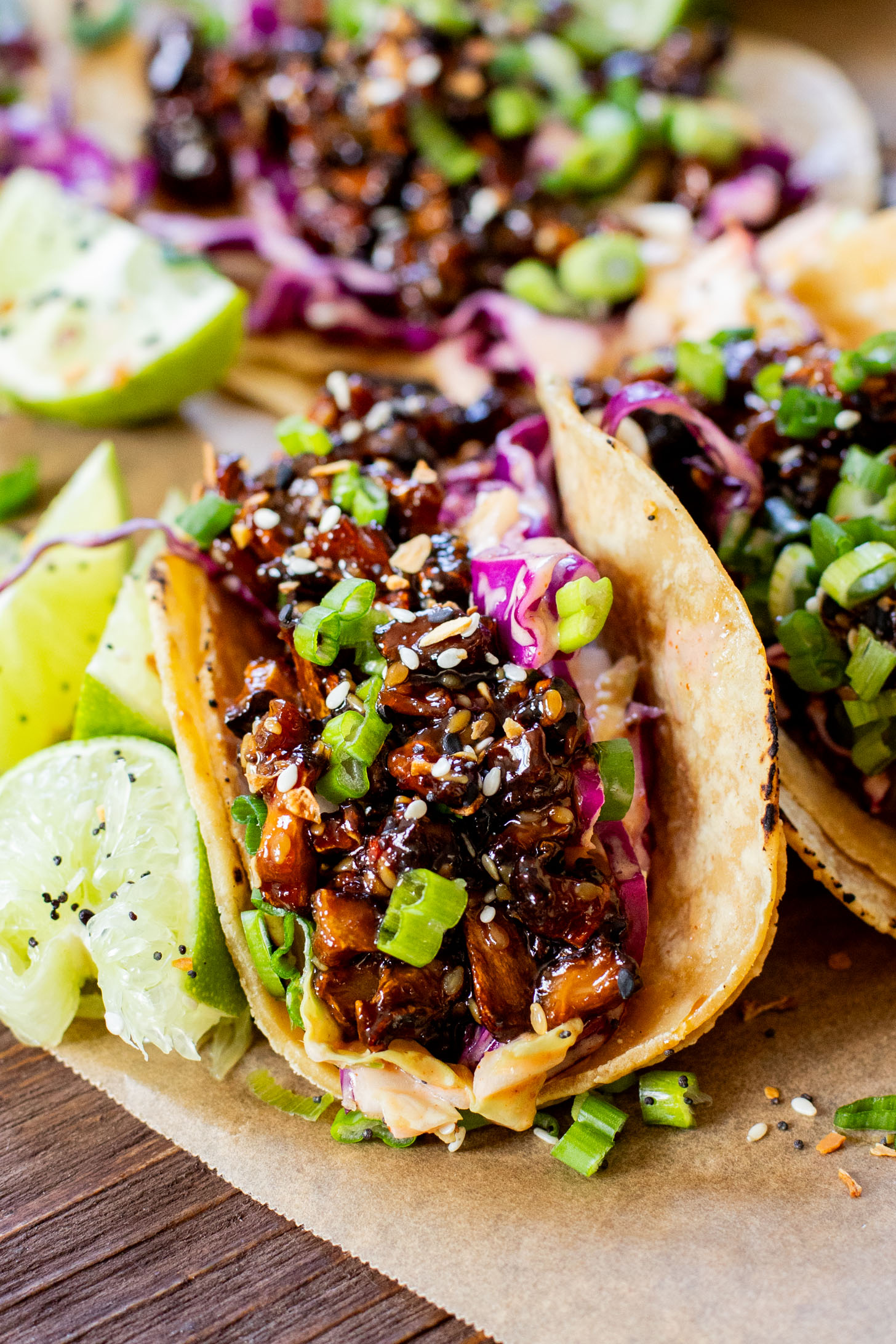 These Soyaki Mushroom Street Tacos are simple, delicious & vegan! Crispy mushrooms tossed in soyaki sauce & spicy slaw on mini corn tortillas | ThisSavoryVegan.com