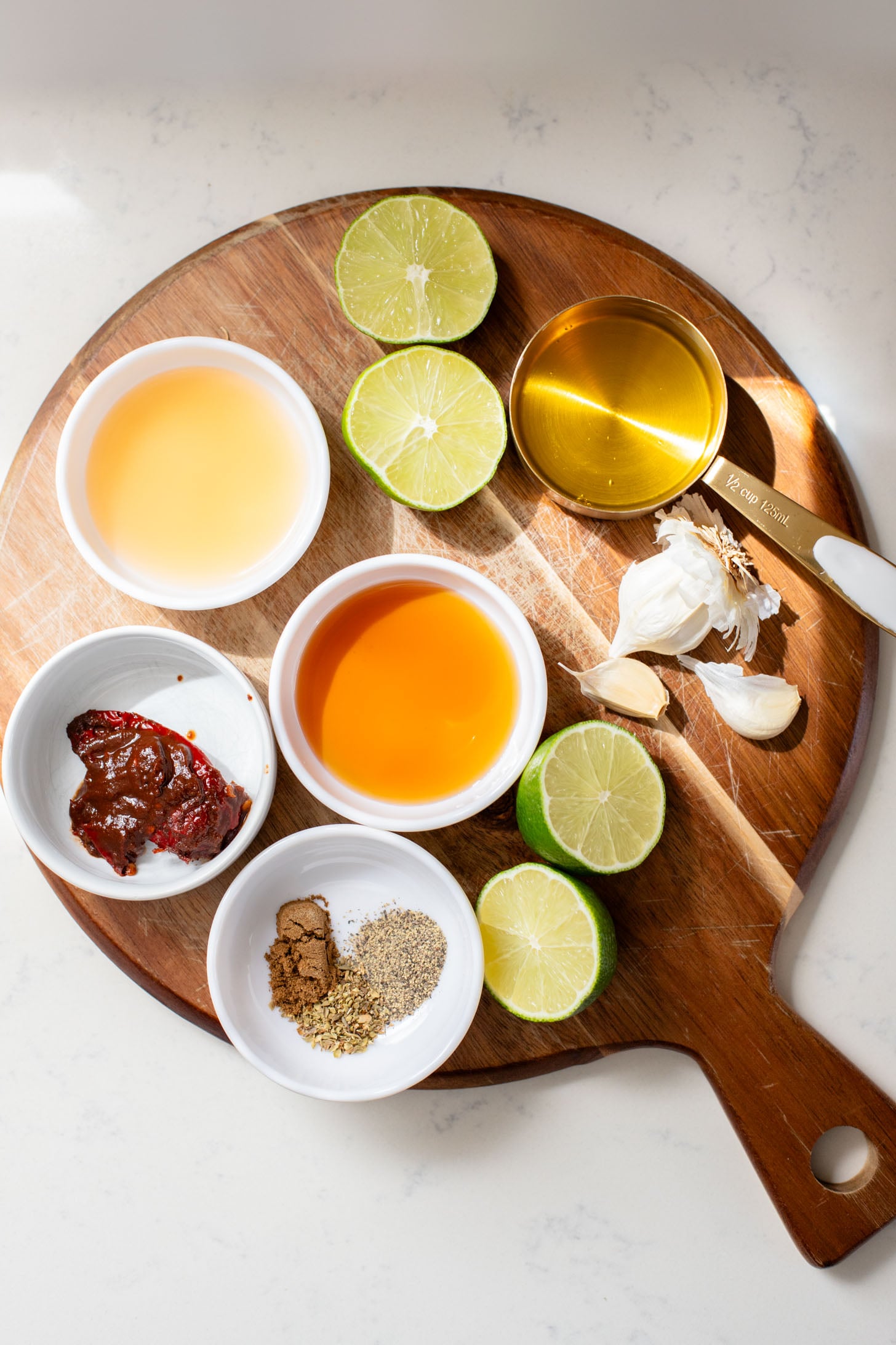 These Roasted Cauliflower & Potato Bowls are layered with seasoned roasted veggies, fresh romaine & a chipotle agave vinaigrette | ThisSavoryVegan.com