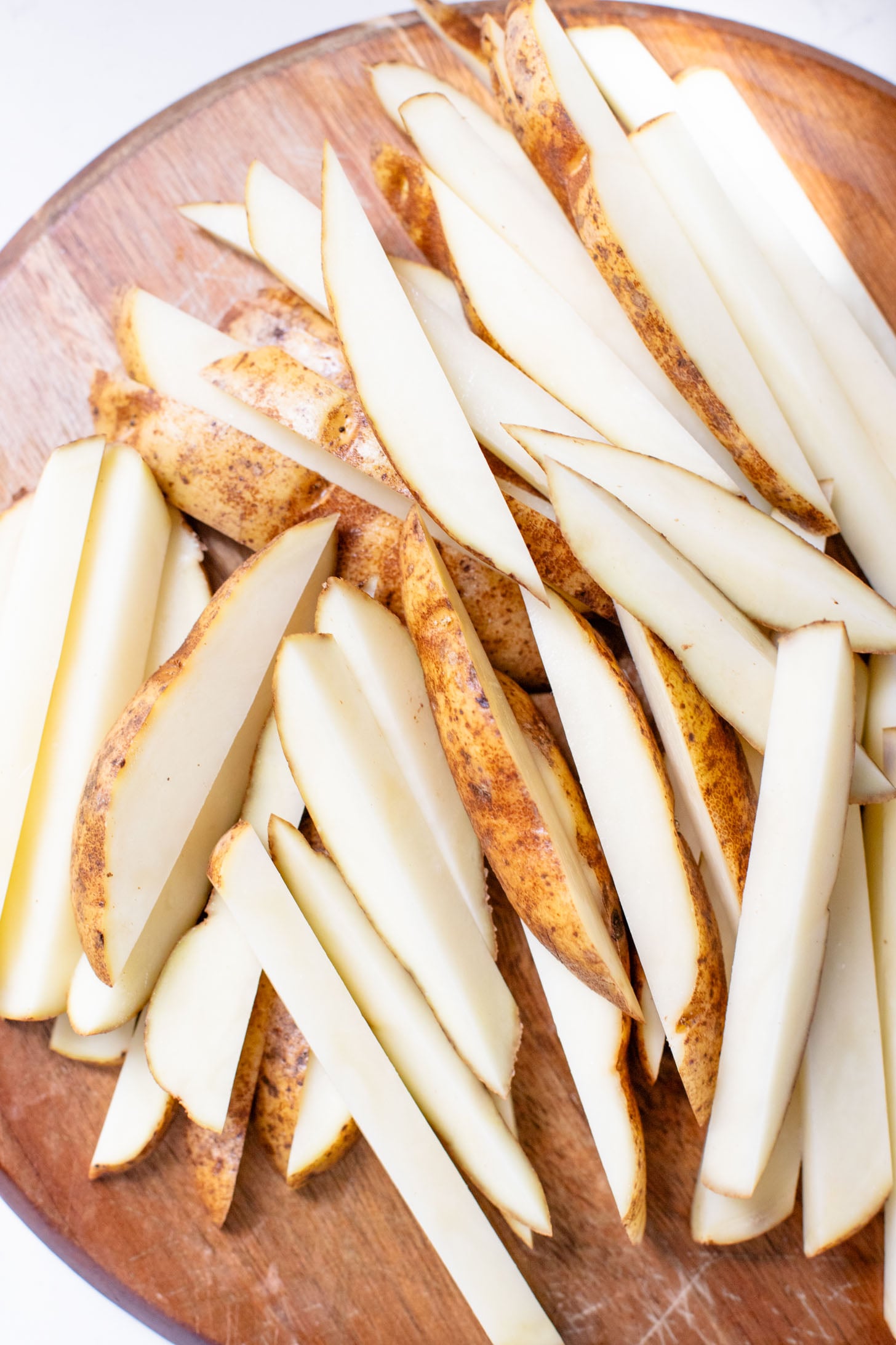 These Roasted Cauliflower & Potato Bowls are layered with seasoned roasted veggies, fresh romaine & a chipotle agave vinaigrette | ThisSavoryVegan.com
