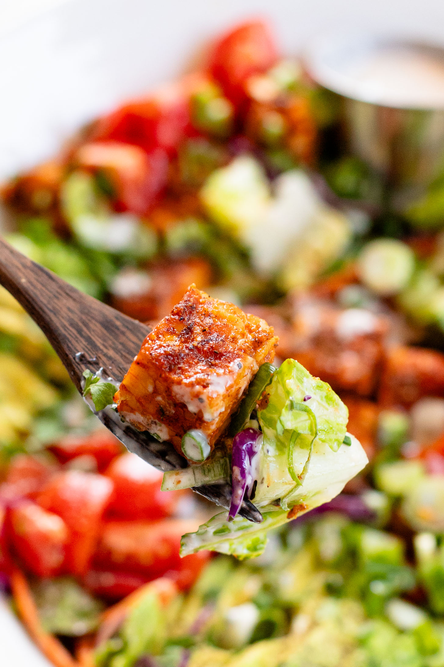 Loaded with crispy buffalo tempeh, vegan ranch and all the crunchy veggies, this Buffalo Tempeh Salad is a healthy, simple and delicious vegan salad | ThisSavoryVegan.com