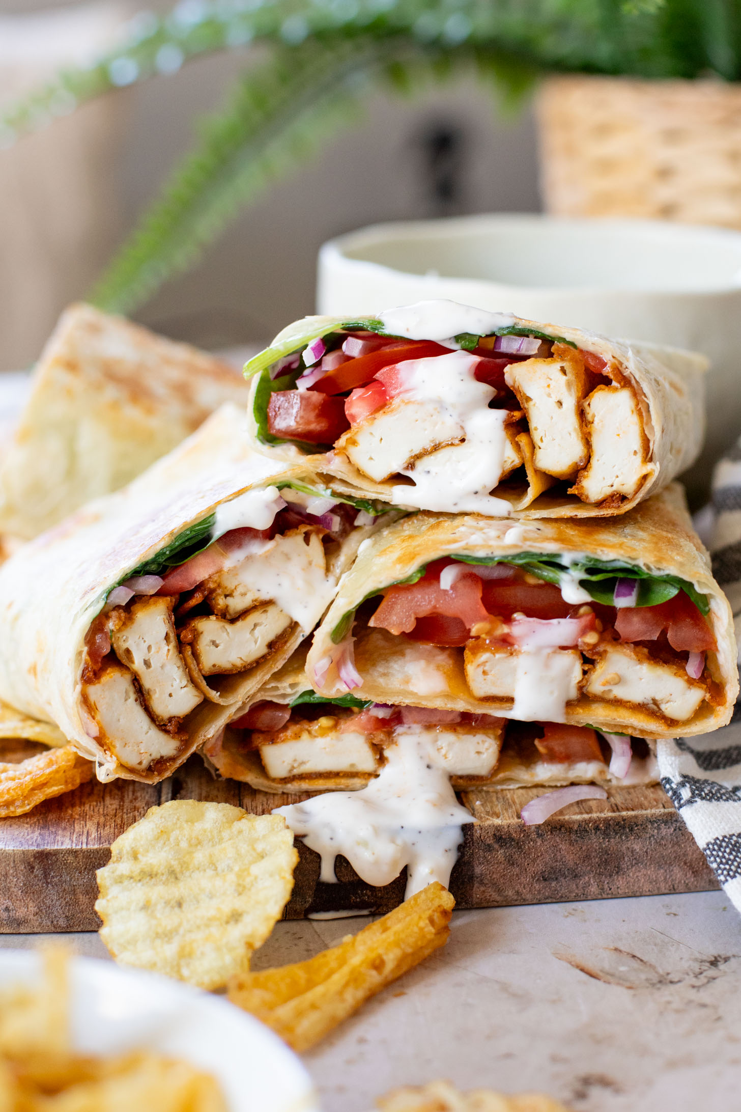 These Cajun Tofu Wraps are filled with baked cajun tofu, veggies and a dairy-free lemon pepper aioli. A great lunch or quick dinner | ThisSavoryVegan.com