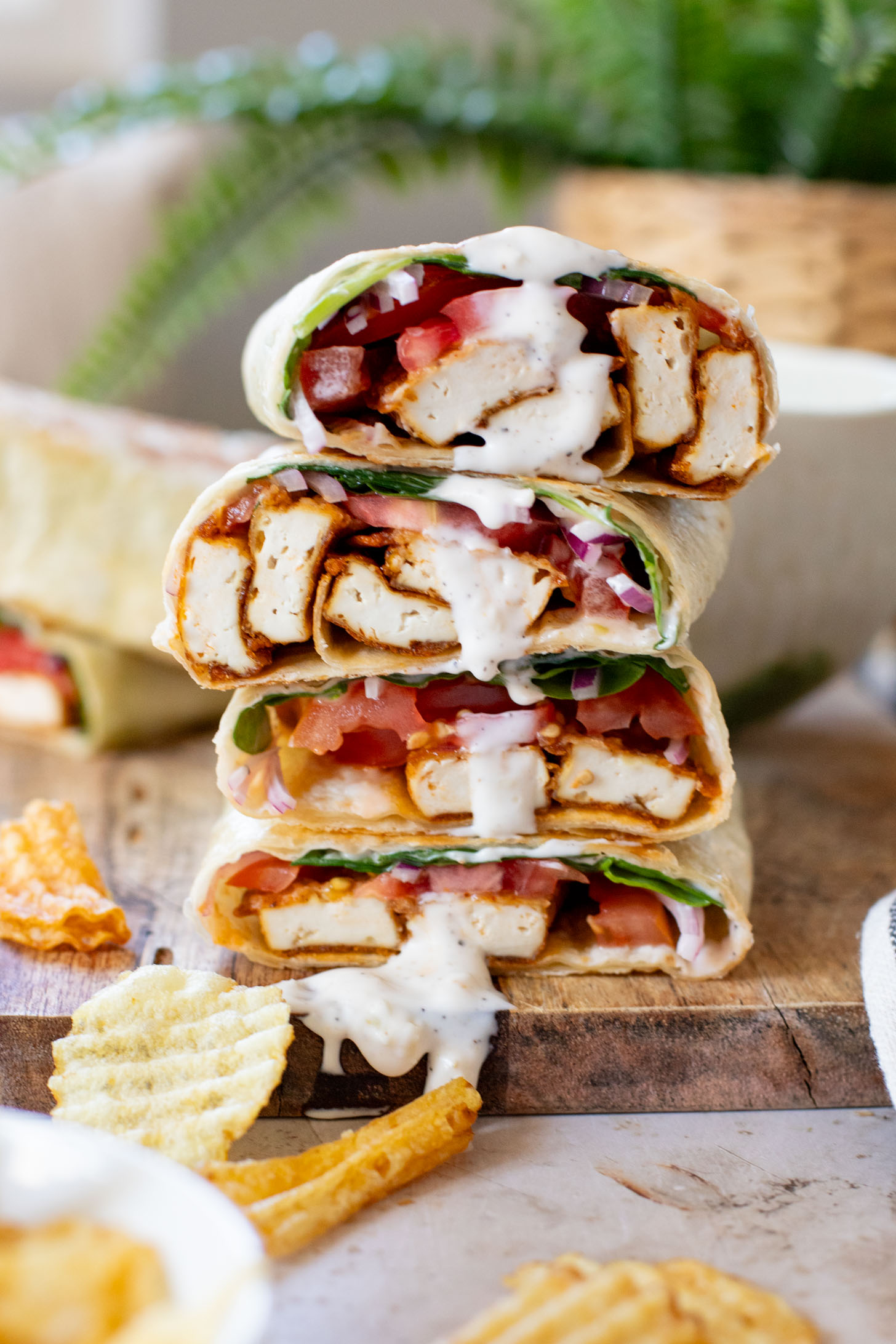 These Cajun Tofu Wraps are filled with baked cajun tofu, veggies and a dairy-free lemon pepper aioli. A great lunch or quick dinner | ThisSavoryVegan.com