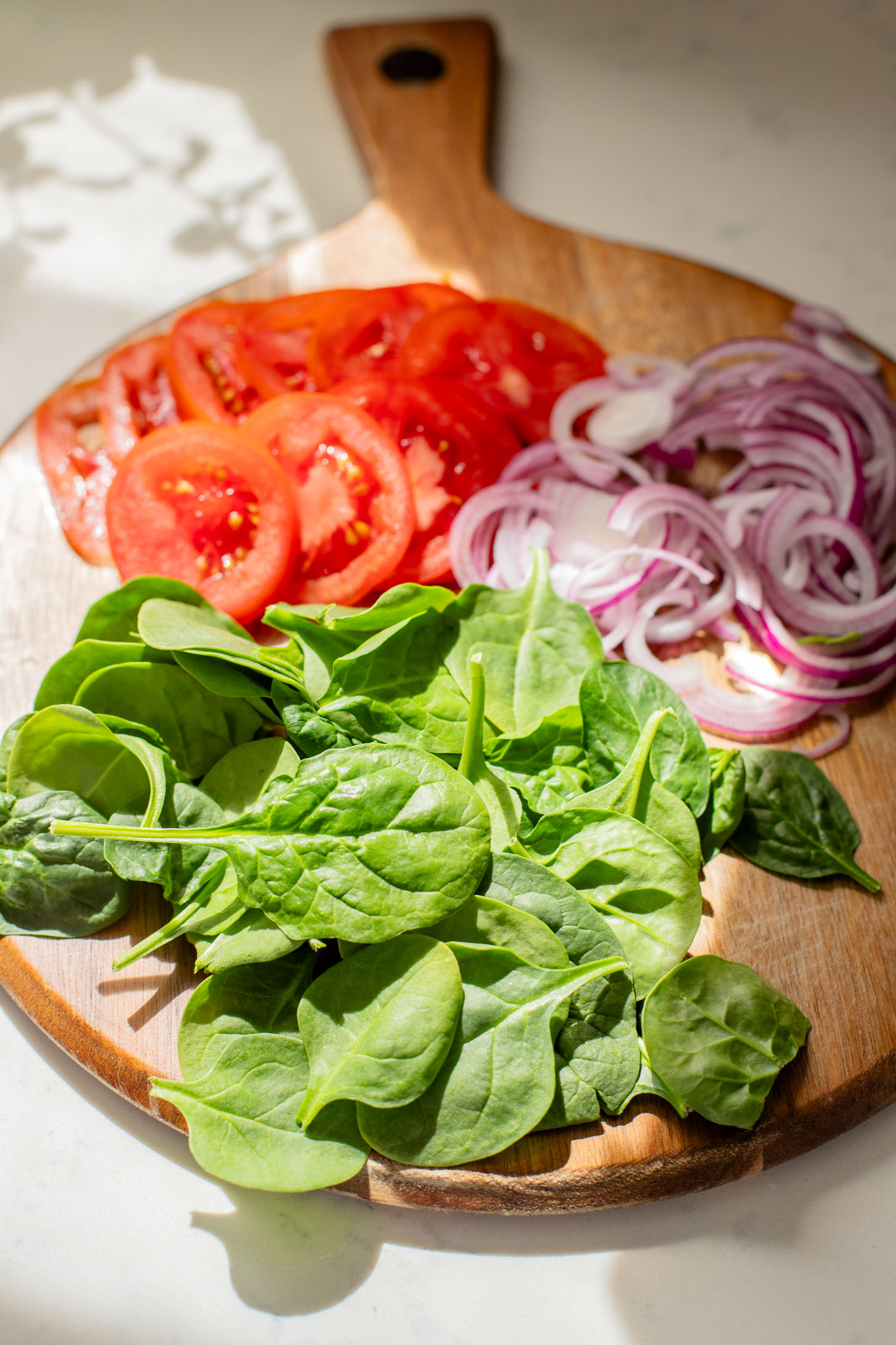 These Cajun Tofu Wraps are filled with baked cajun tofu, veggies and a dairy-free lemon pepper aioli. A great lunch or quick dinner | ThisSavoryVegan.com