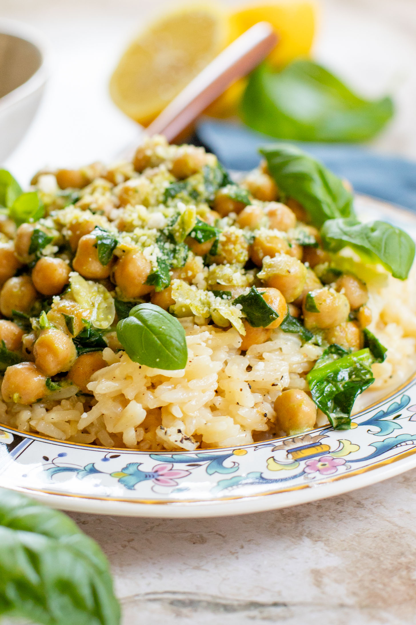 These Creamy Spinach & Pesto Chickpeas are served with lemon parmesan rice. A delicious vegan dinner that takes less than an hour | ThisSavoryVegan.com