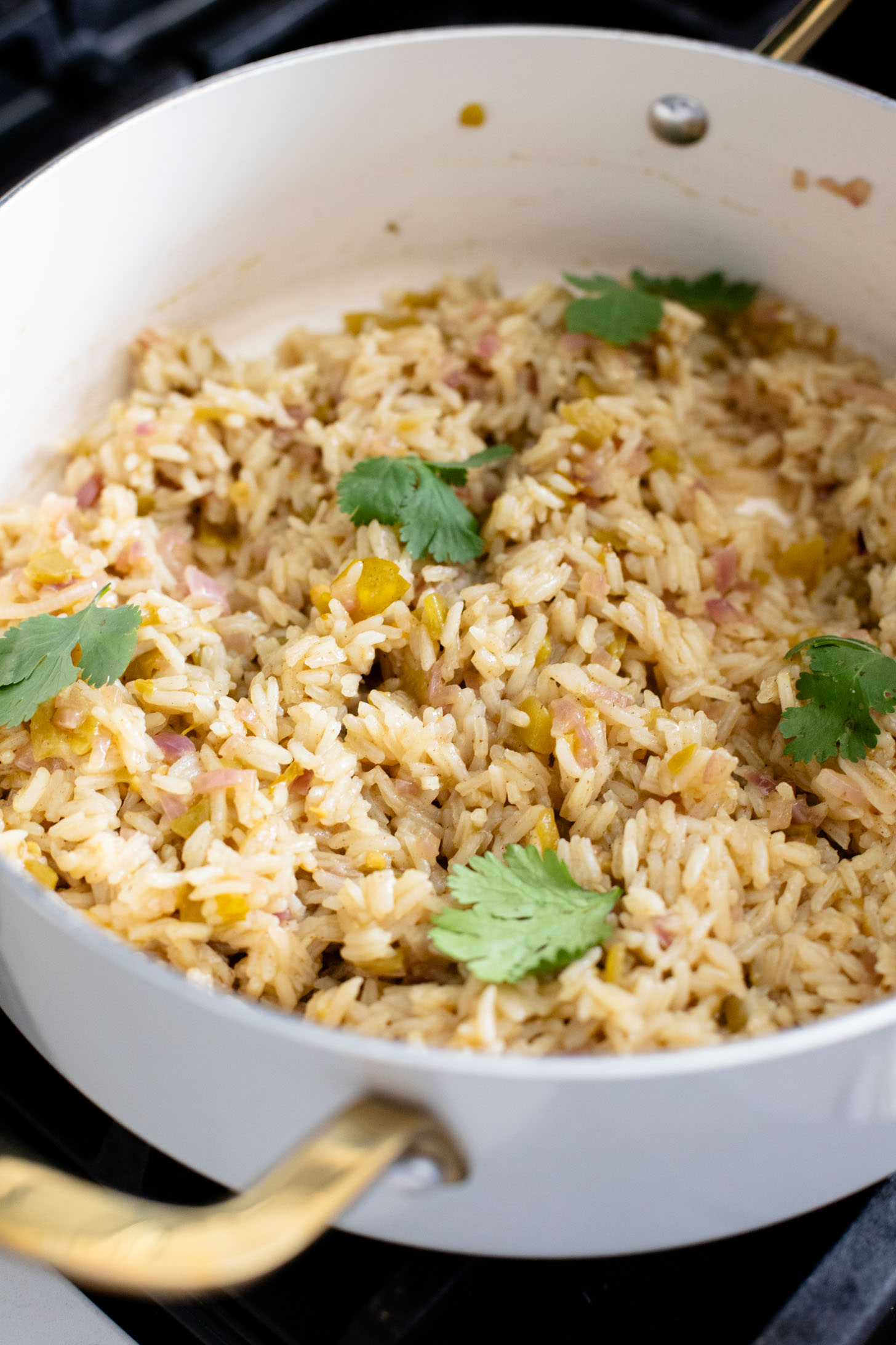 These Crispy Potato & Green Chile Rice Bowls are filled with flavor-packed rice, crispy potatoes, soy chorizo & a cilantro lime sauce | ThisSavoryVegan.com