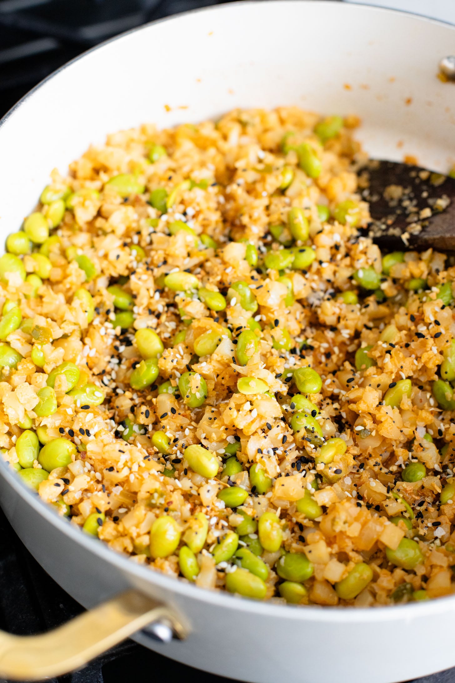 These Ginger Garlic Vegan Beef Bowls are layered with edamame cauliflower rice, saucy vegan beef crumbles and spicy mayo | ThisSavoryVegan.com