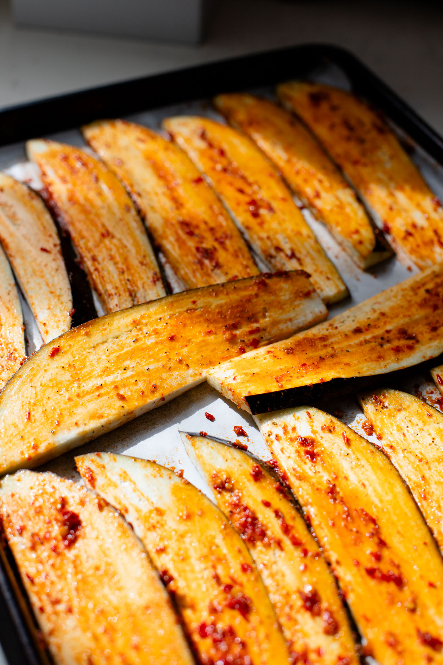 This Harissa Eggplant Picnic Sandwich is perfect for lunch outings. Made with ciabatta and layered with loads of veggies, pesto & tahini sauce | ThisSavoryVegan.com