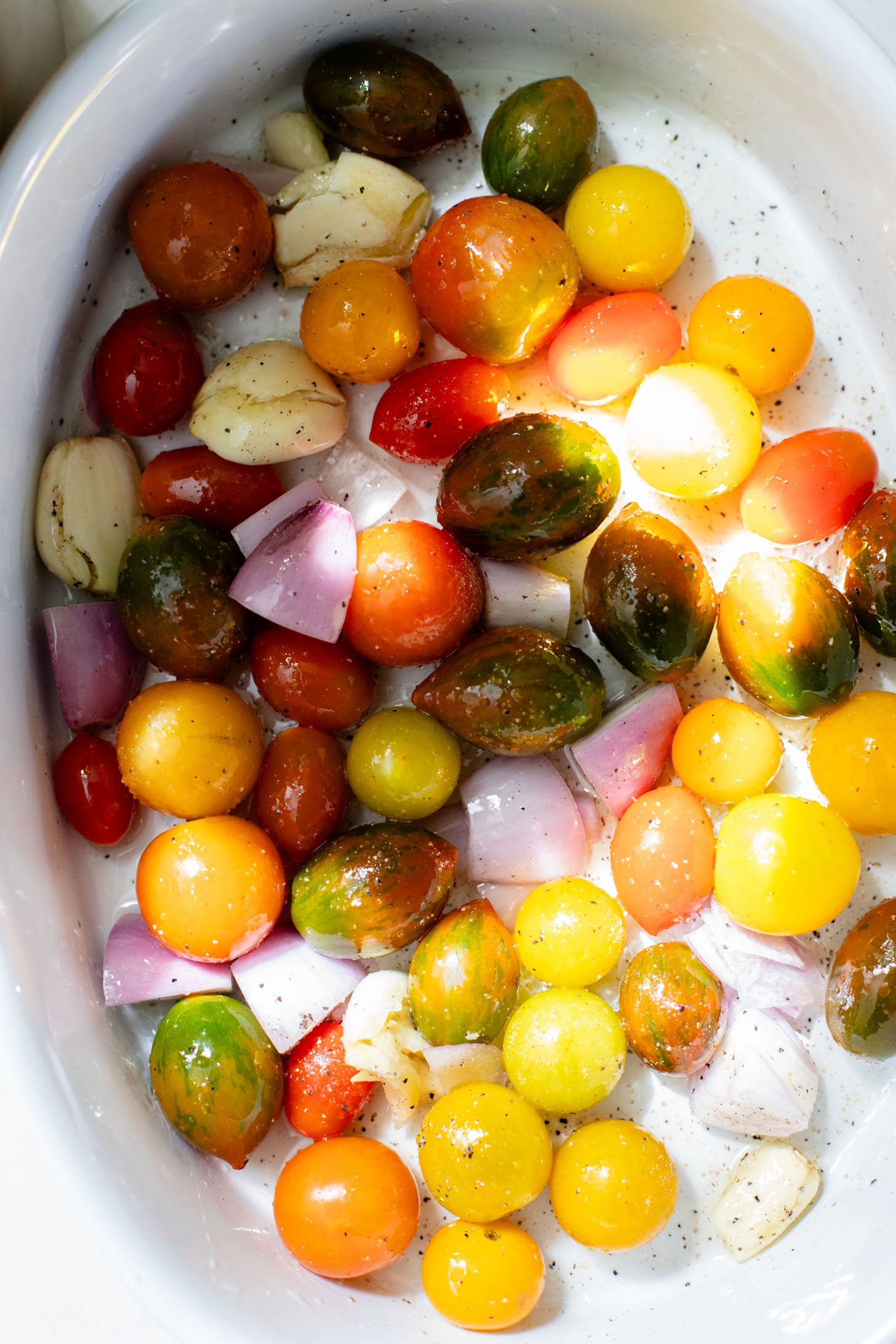 Creamy & delicious, this Roasted Tomato Pesto Orzo is a vegan dream! Tomatoes & garlic are roasted until tender and cooked with orzo & pesto | ThisSavoryVegan.com