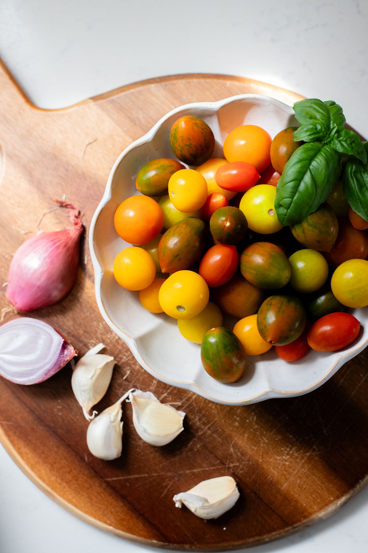 Creamy & delicious, this Roasted Tomato Pesto Orzo is a vegan dream! Tomatoes & garlic are roasted until tender and cooked with orzo & pesto | ThisSavoryVegan.com
