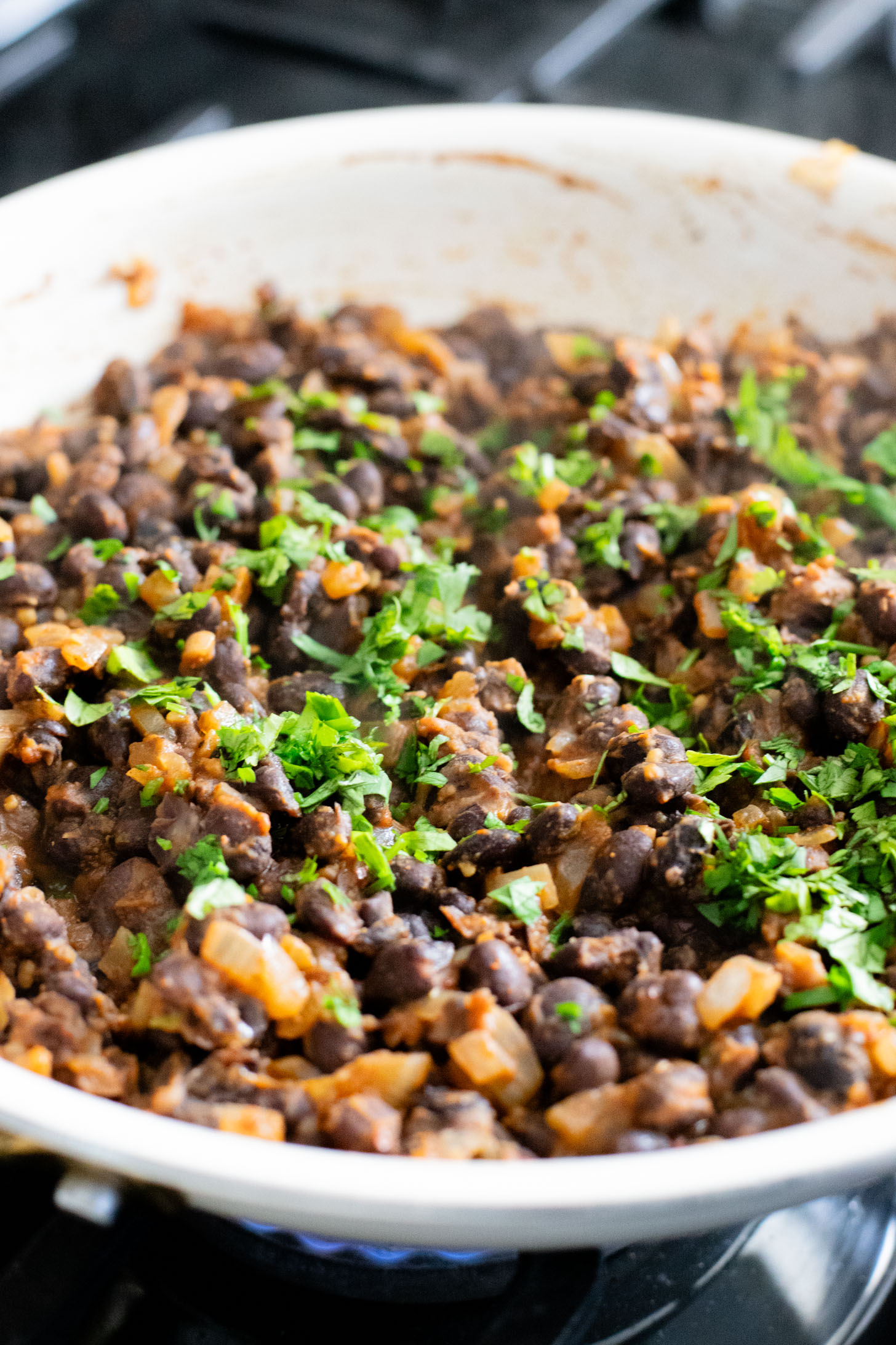 Quick & easy, these Simple Black Bean Tostadas are 100% vegan! Topped with a chunky avocado salsa and chipotle mayo | ThisSavoryVegan.com