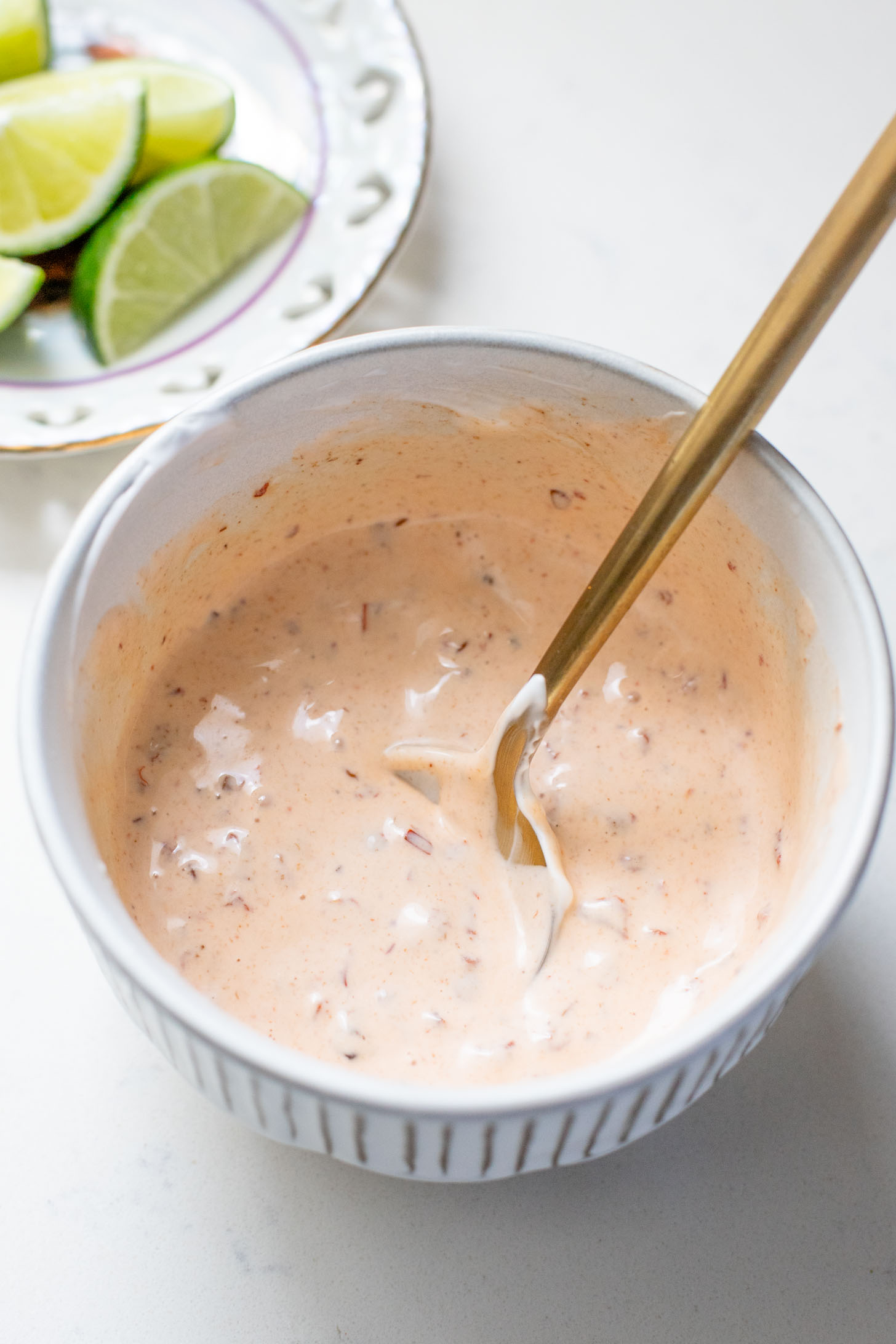 Quick & easy, these Simple Black Bean Tostadas are 100% vegan! Topped with a chunky avocado salsa and chipotle mayo | ThisSavoryVegan.com