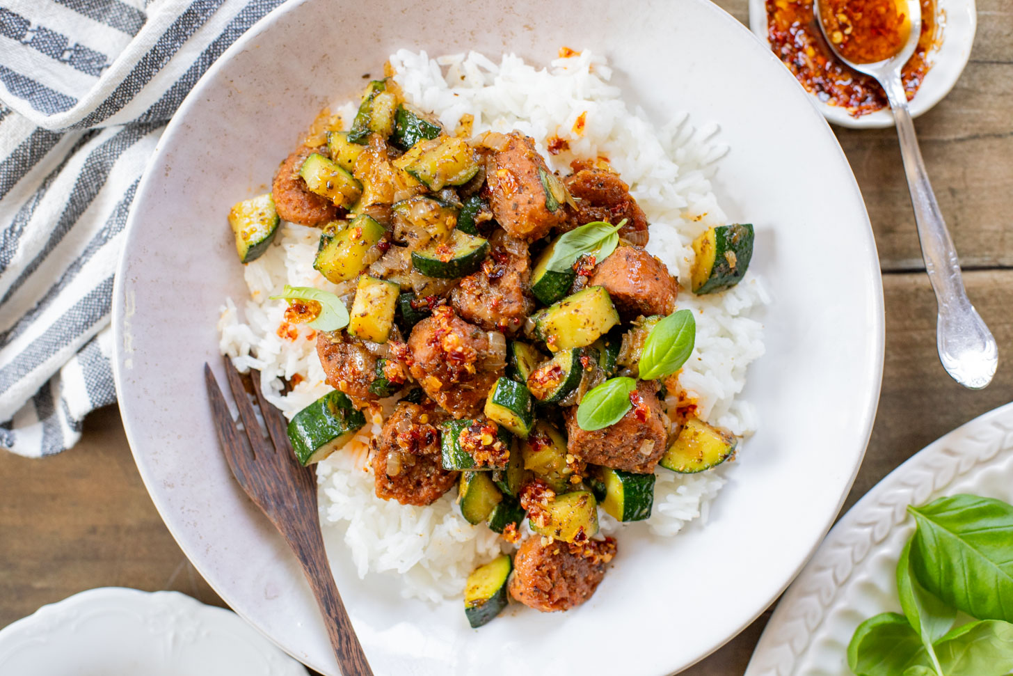This Vegan Sausage & Zucchini Skillet is a healthy, high-protein vegan dinner idea. Serve over rice for a simple meal ready in less than 30 minutes | ThisSavoryVegan.com