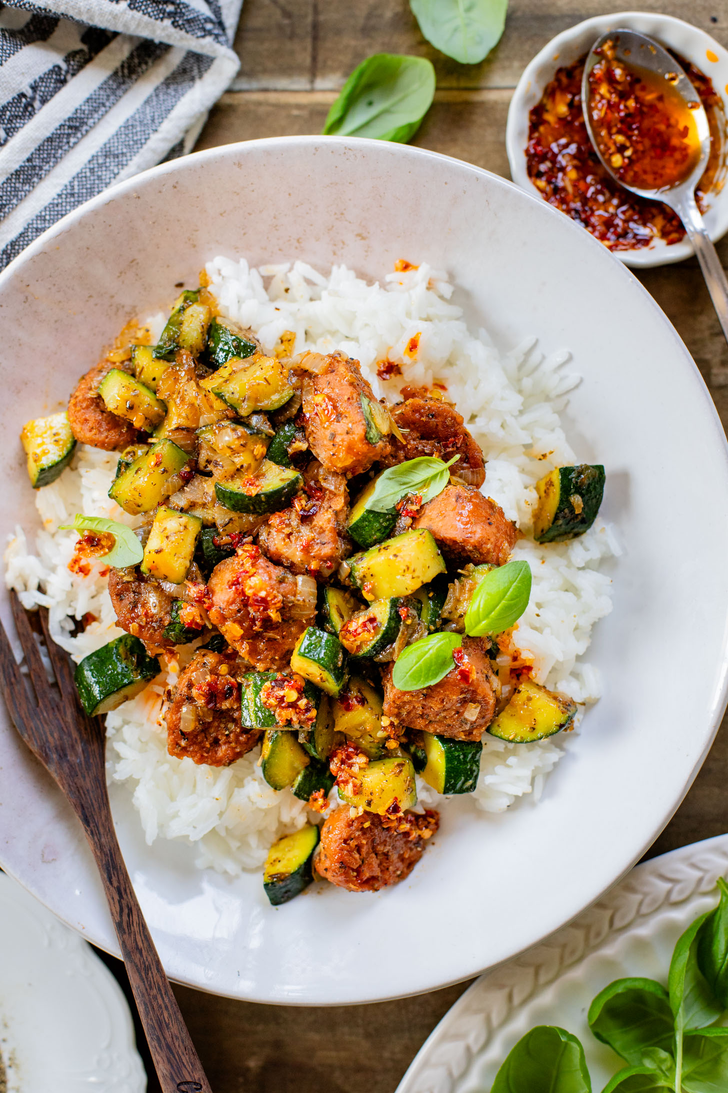 This Vegan Sausage & Zucchini Skillet is a healthy, high-protein vegan dinner idea. Serve over rice for a simple meal ready in less than 30 minutes | ThisSavoryVegan.com