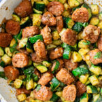 This Vegan Sausage & Zucchini Skillet is a healthy, high-protein vegan dinner idea. Serve over rice for a simple meal ready in less than 30 minutes | ThisSavoryVegan.com