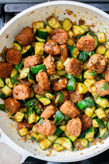 This Vegan Sausage & Zucchini Skillet is a healthy, high-protein vegan dinner idea. Serve over rice for a simple meal ready in less than 30 minutes | ThisSavoryVegan.com