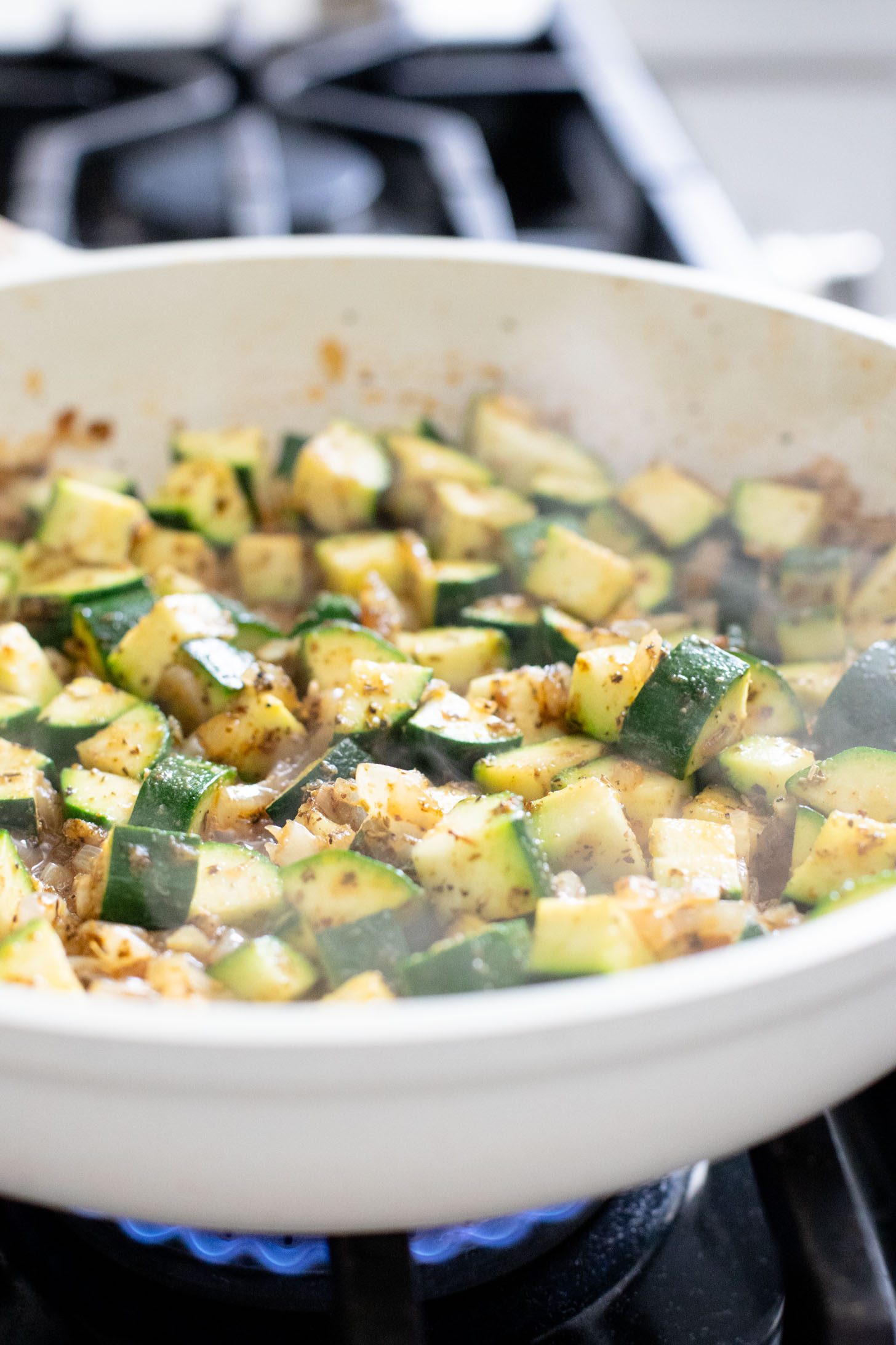 This Vegan Sausage & Zucchini Skillet is a healthy, high-protein vegan dinner idea. Serve over rice for a simple meal ready in less than 30 minutes | ThisSavoryVegan.com