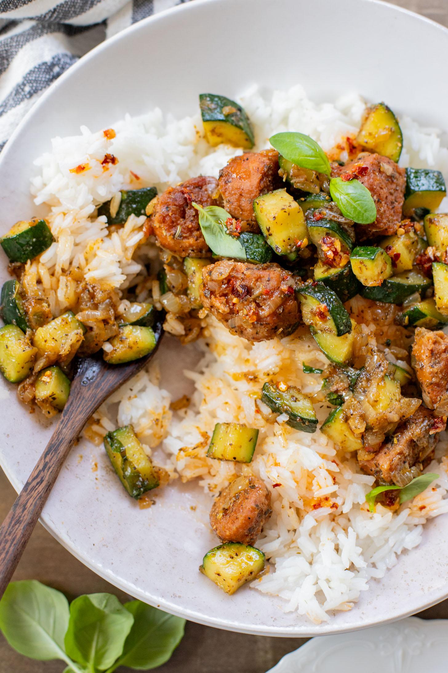 This Vegan Sausage & Zucchini Skillet is a healthy, high-protein vegan dinner idea. Serve over rice for a simple meal ready in less than 30 minutes | ThisSavoryVegan.com