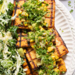 Get ready for grilling season with these Chipotle Tofu Steaks with Avocado Corn Salsa - made with Nasoya's Super Firm Tofu and grilled until crispy | ThisSavoryVegan.com