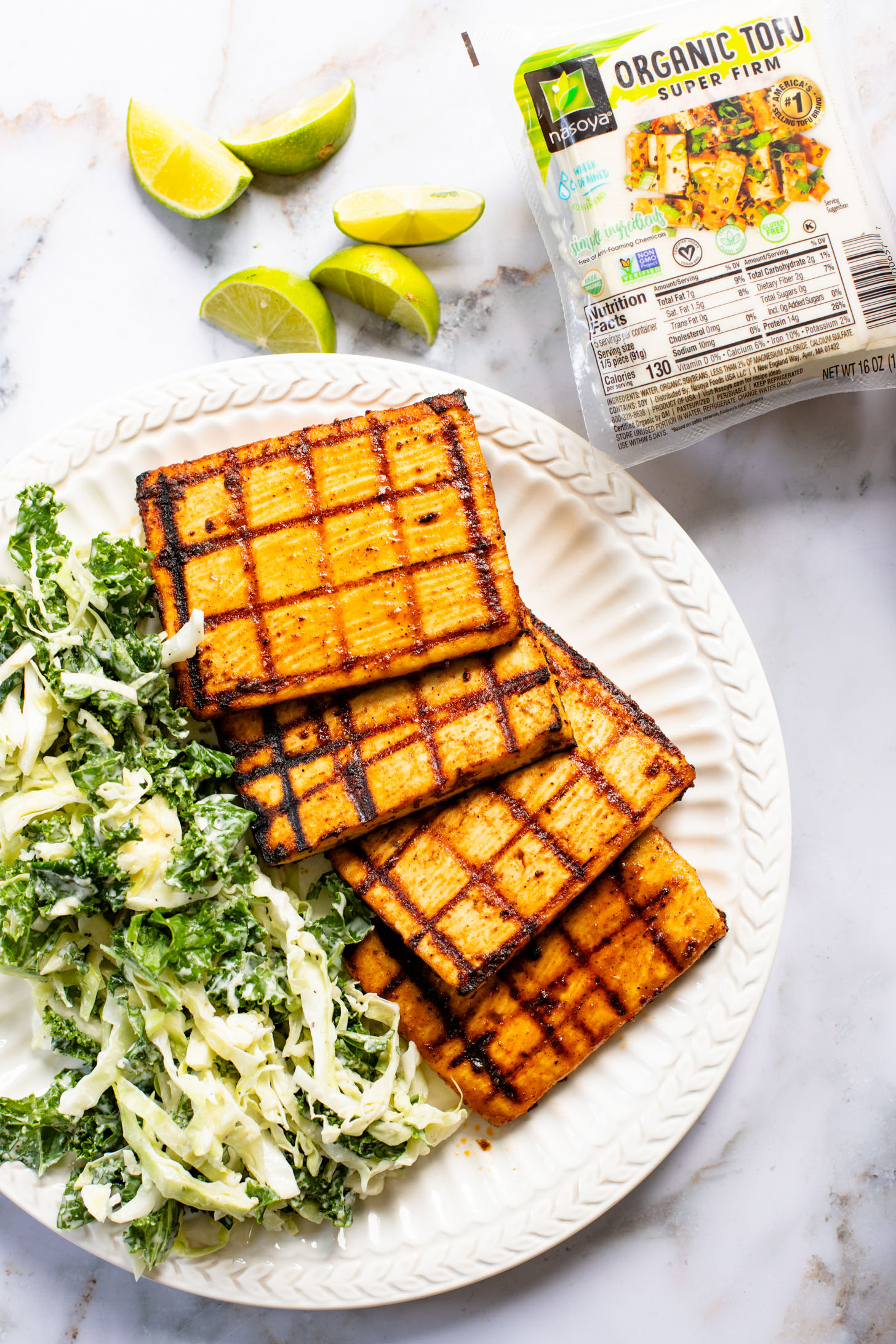 Get ready for grilling season with these Chipotle Tofu Steaks with Avocado Corn Salsa - made with Nasoya's Super Firm Tofu and grilled until crispy | ThisSavoryVegan.com