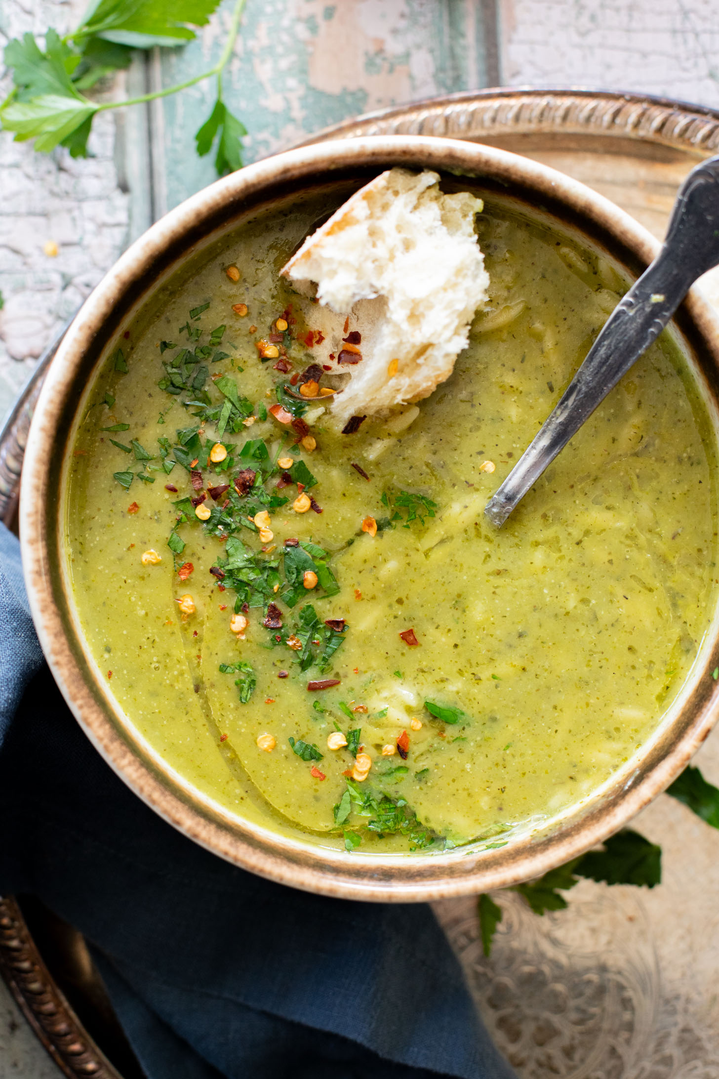 This Creamy Zucchini Pesto Soup is 100% dairy-free! A creamy pesto, & zucchini base is mixed with orzo for the perfect bite | ThisSavoryVegan.com