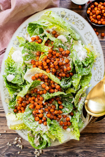 This Little Gem Vegan Ranch Salad is loaded with crisp lettuce, creamy vegan ranch, sunflower seeds and crispy harissa chickpeas | ThisSavoryVegan.com