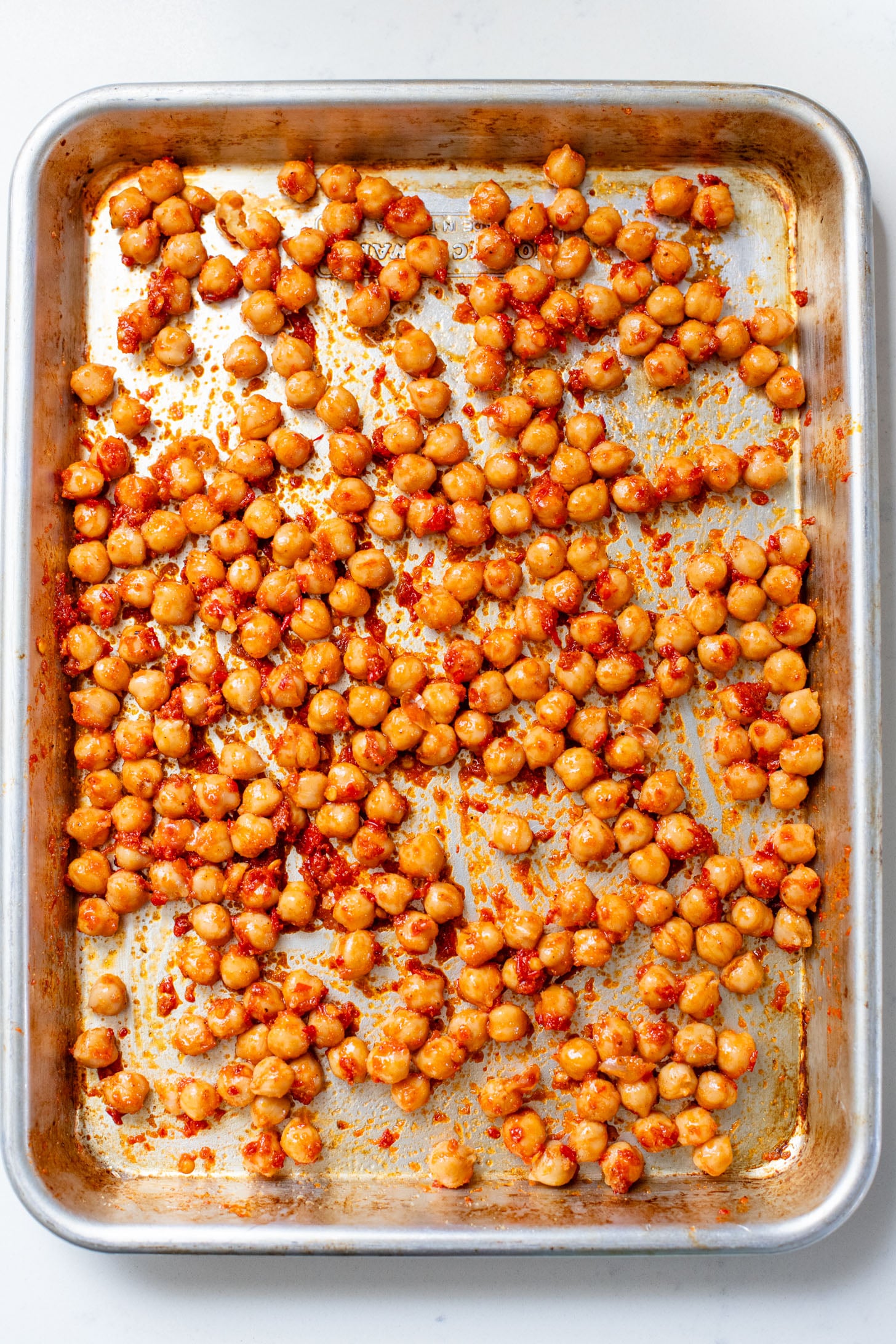 This Little Gem Vegan Ranch Salad is loaded with crisp lettuce, creamy vegan ranch, sunflower seeds and crispy harissa chickpeas | ThisSavoryVegan.com