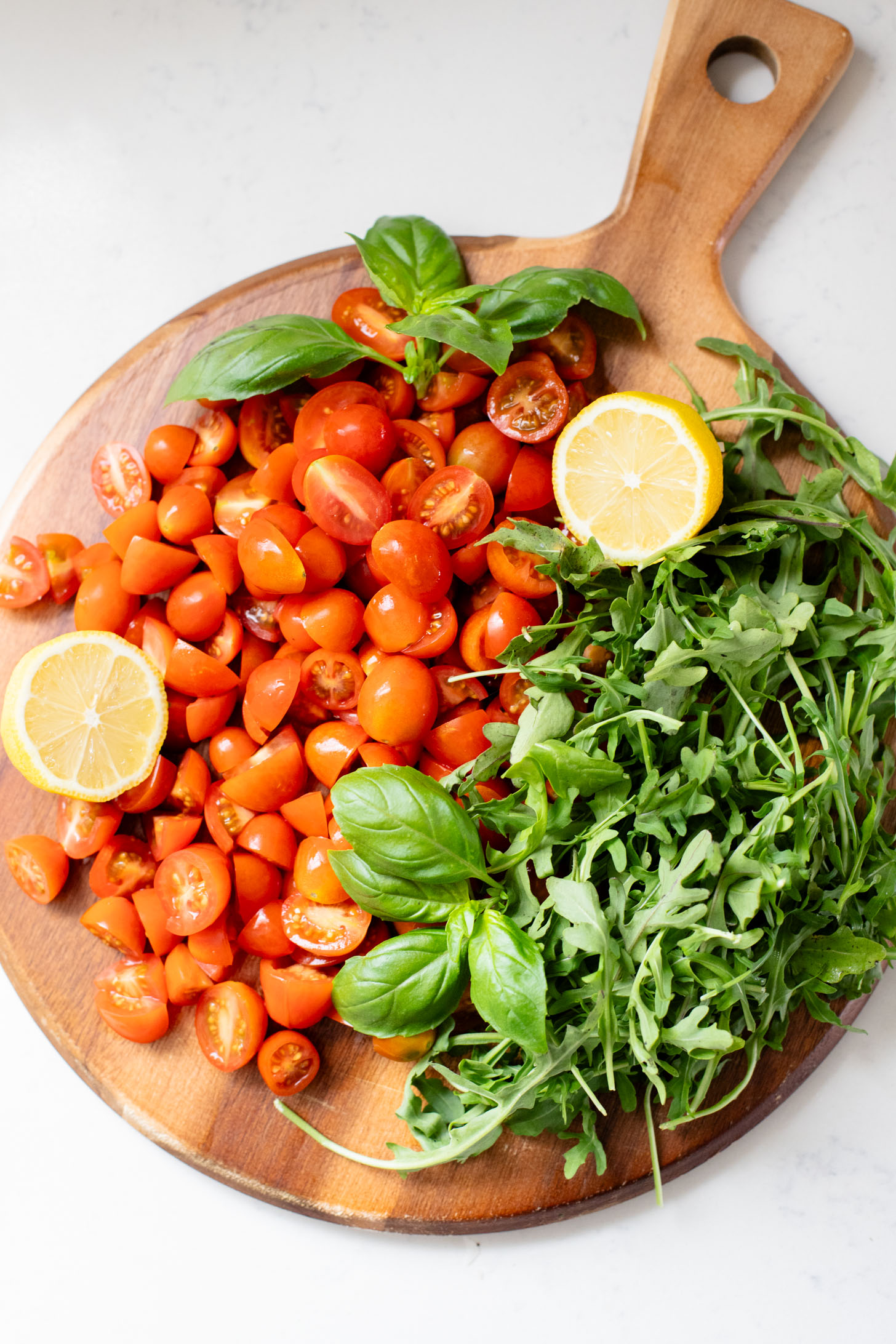 This Pesto Tortellini Pasta Salad is made with a vegan red pepper pesto, tomatoes & arugula. A great vegan side dish for a BBQ | ThisSavoryVegan.com
