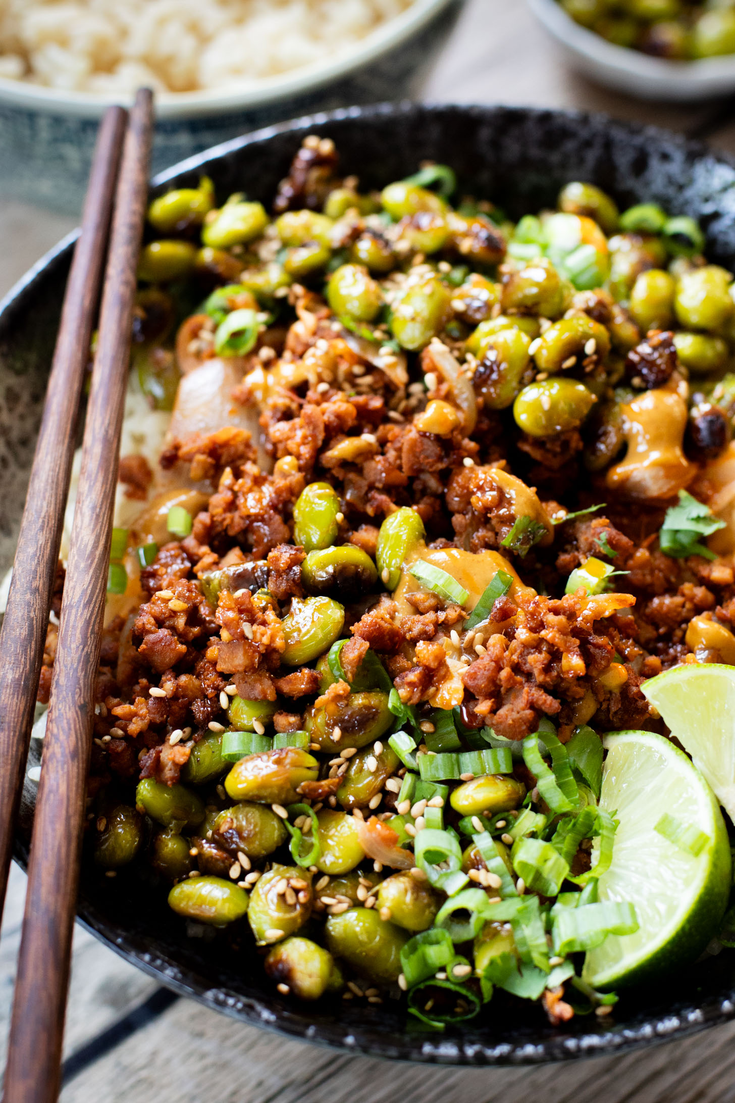 This Sheet Pan Red Curry Vegan Beef is the perfect weeknight dinner! Served with coconut rice, crispy edamame and spicy peanut sauce | ThisSavoryVegan.com